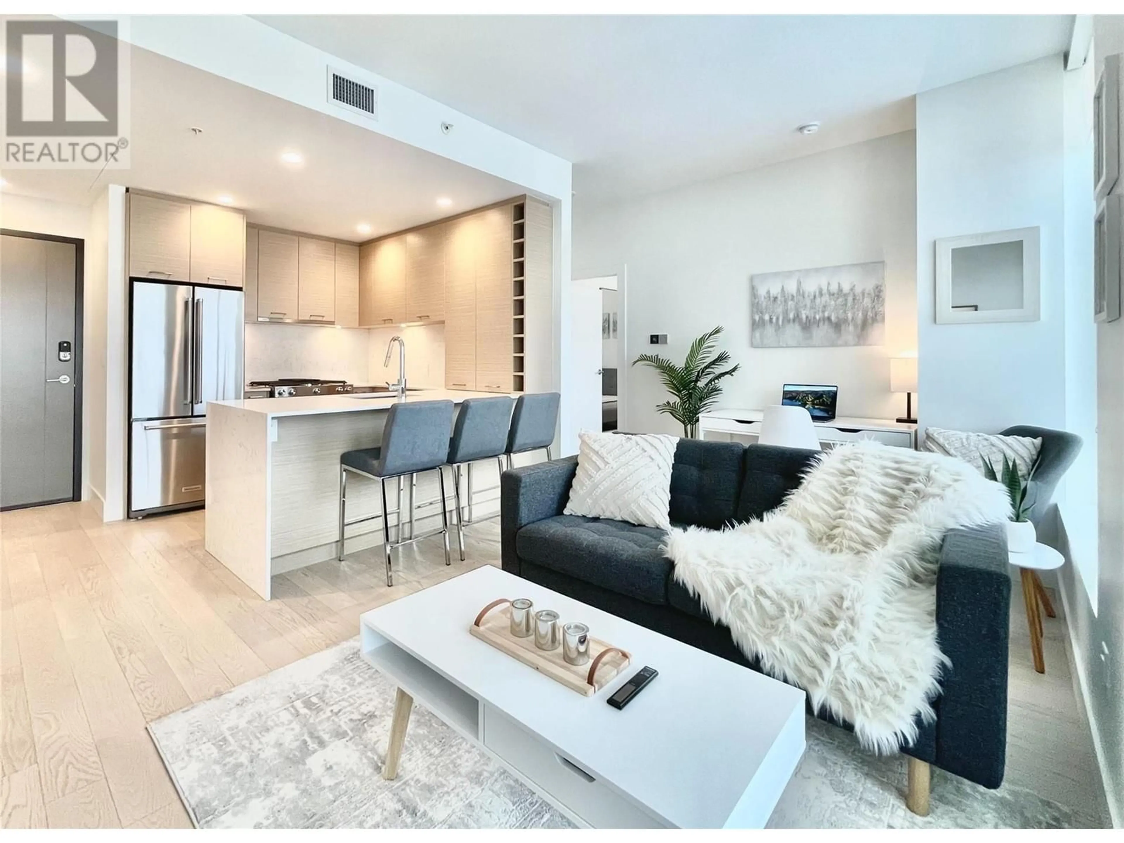 Living room with furniture, unknown for 1307 - 1181 SUNSET DRIVE, Kelowna British Columbia V1Y0L4