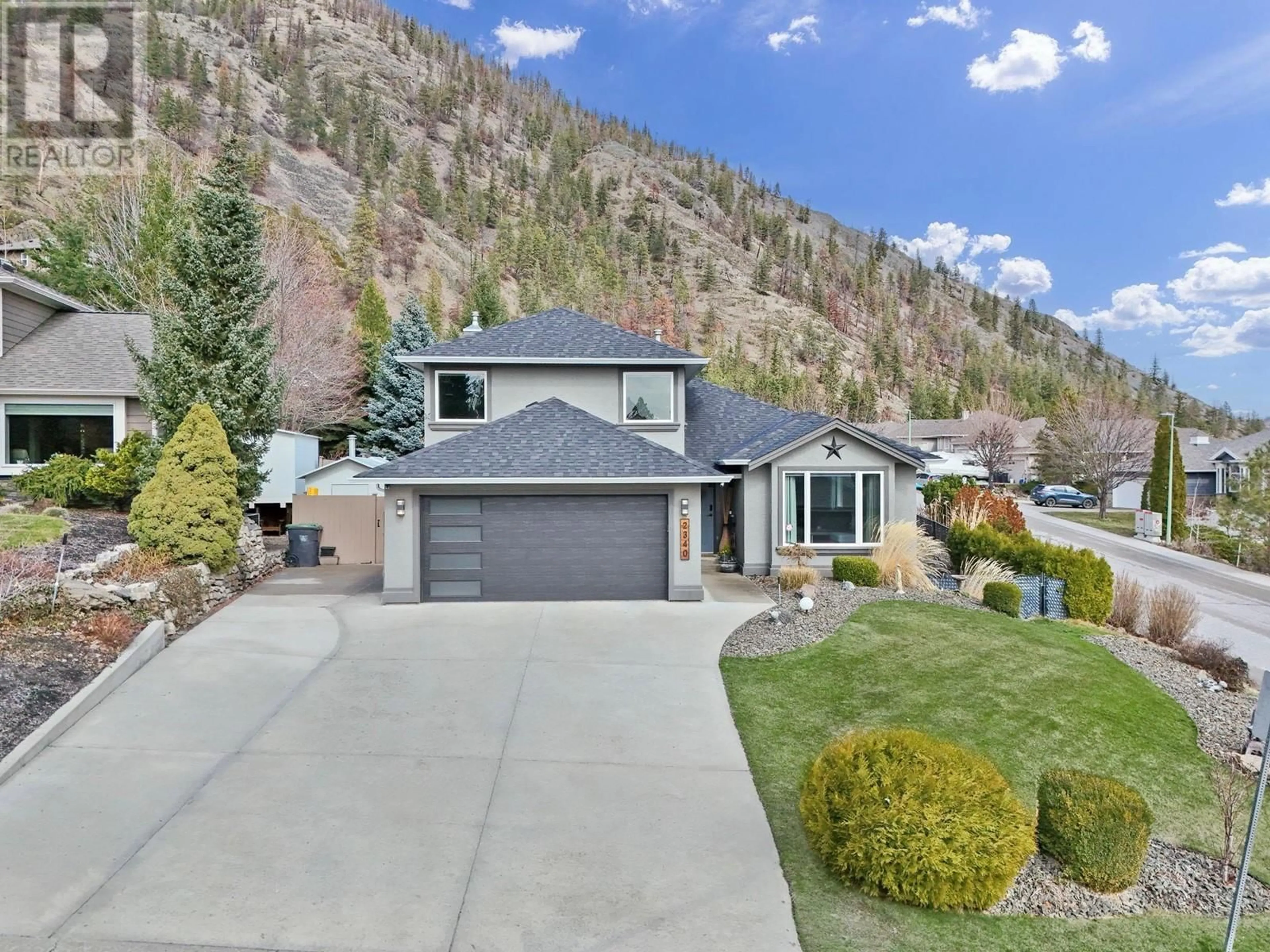 A pic from outside/outdoor area/front of a property/back of a property/a pic from drone, mountain view for 2340 SHANNON WOODS DRIVE, West Kelowna British Columbia V4T2P1