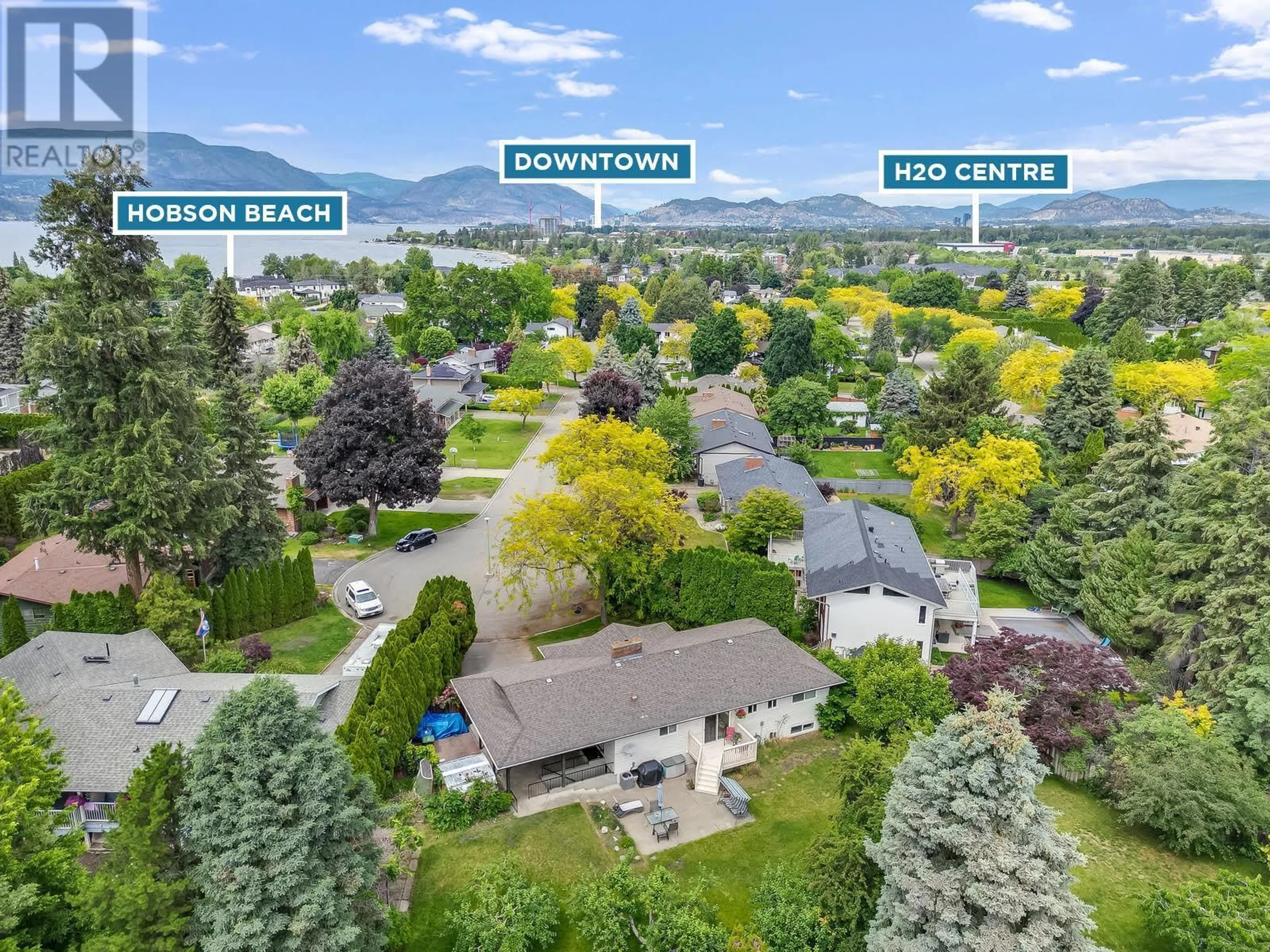 A pic from outside/outdoor area/front of a property/back of a property/a pic from drone, mountain view for 605 SAN MICHELLE ROAD, Kelowna British Columbia V1W2J5