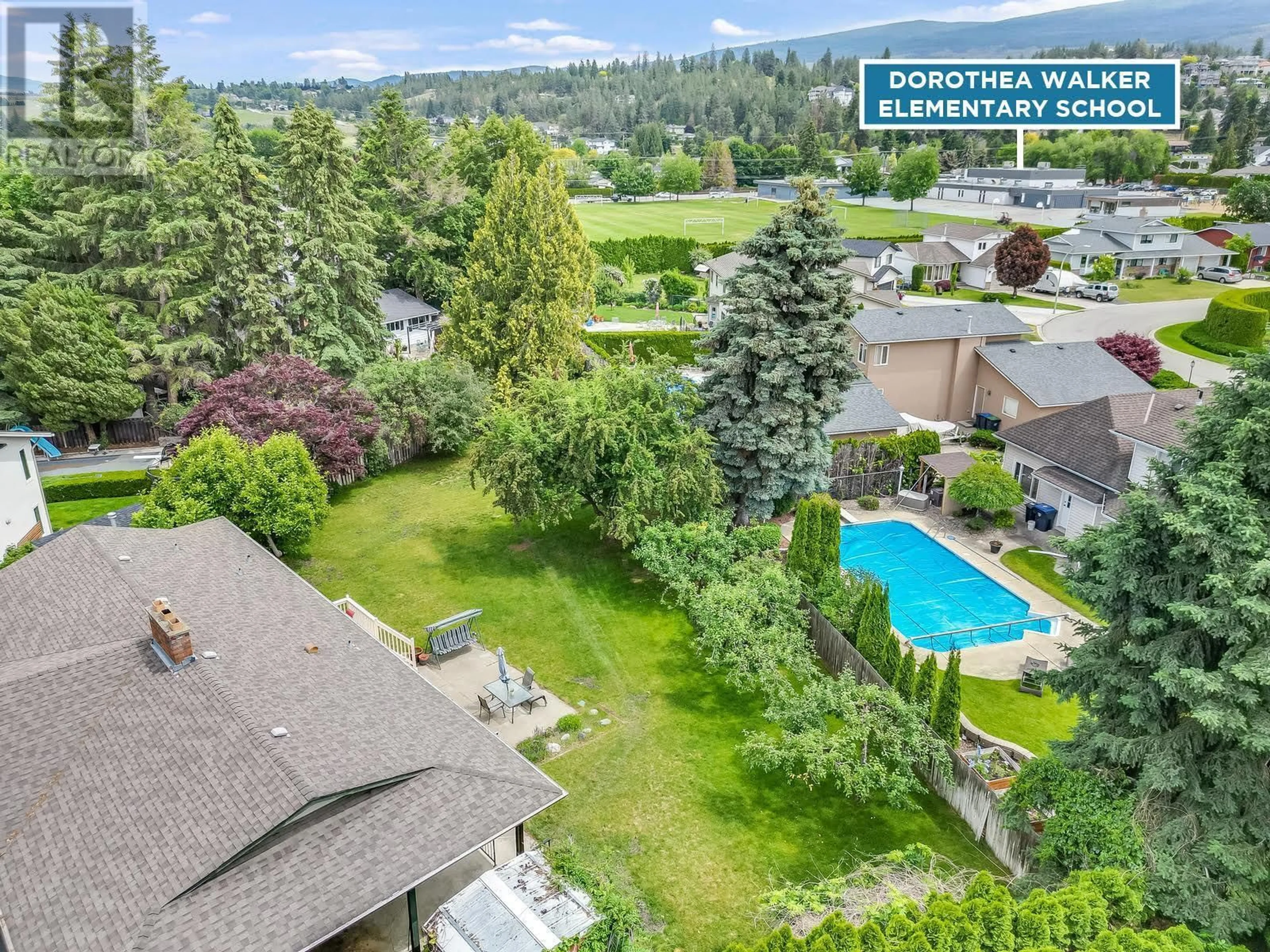 A pic from outside/outdoor area/front of a property/back of a property/a pic from drone, water/lake/river/ocean view for 605 SAN MICHELLE ROAD, Kelowna British Columbia V1W2J5