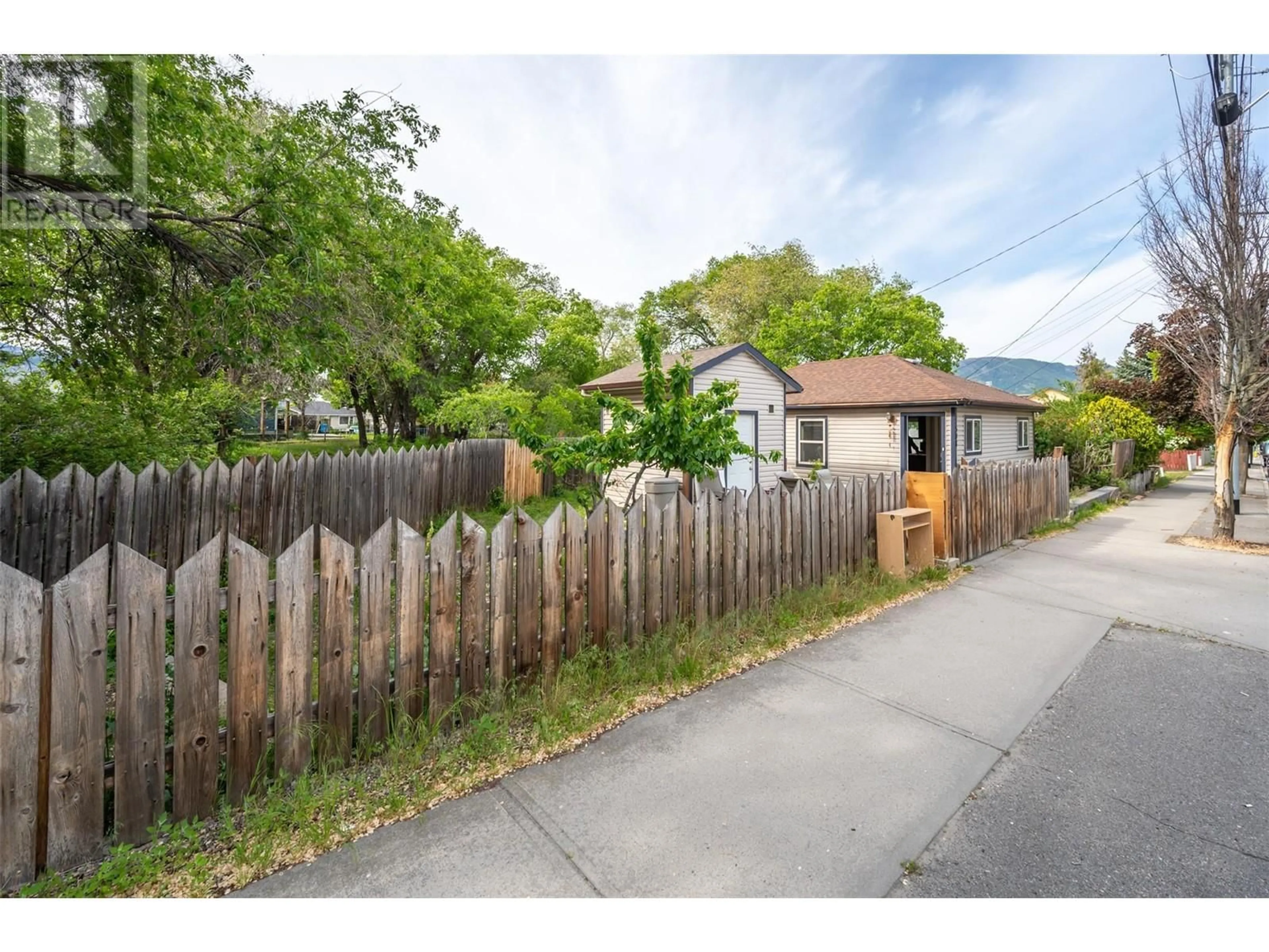 A pic from outside/outdoor area/front of a property/back of a property/a pic from drone, street for 508 ECKHARDT AVENUE EAST, Penticton British Columbia V2A1Z8