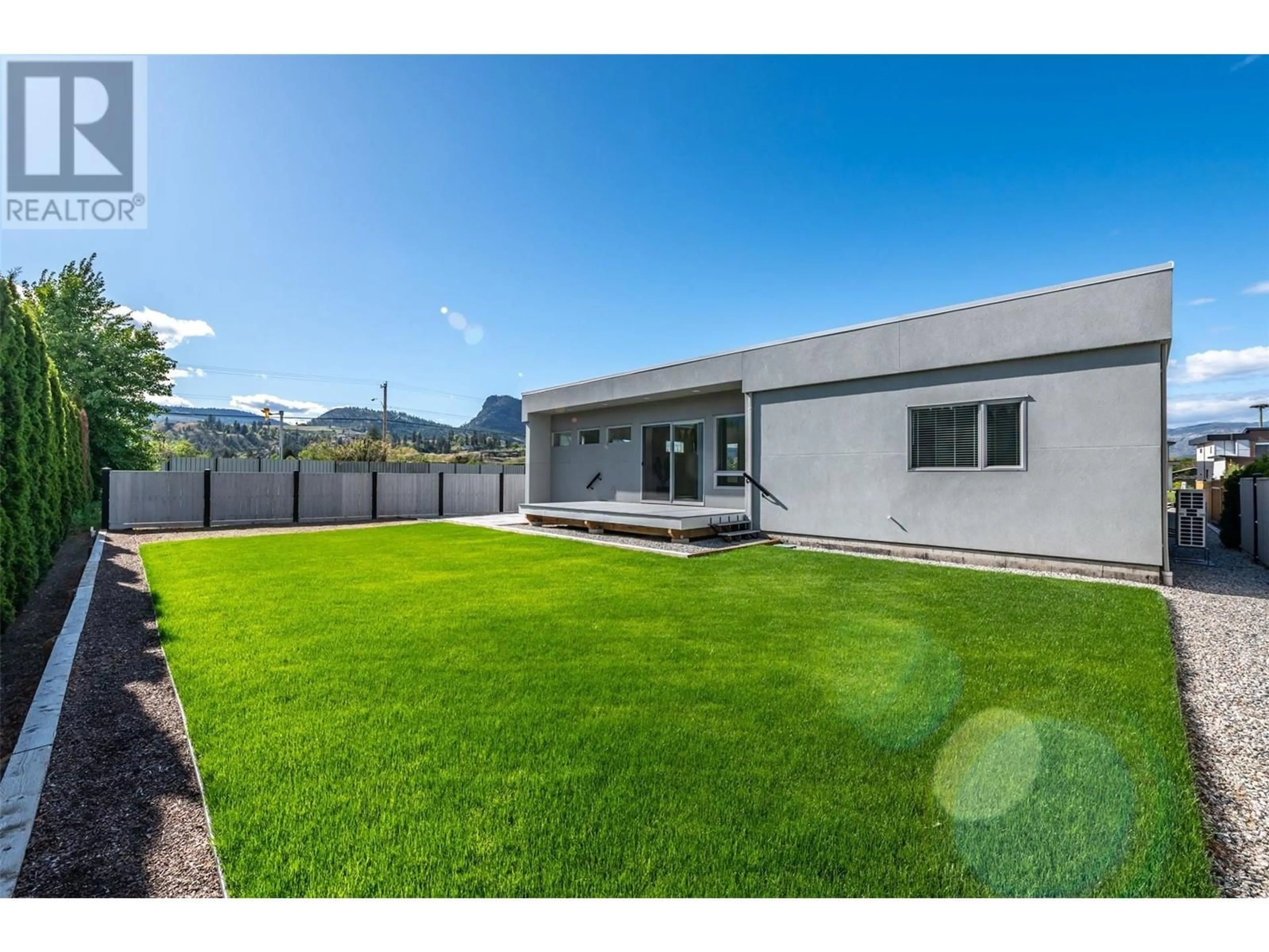 A pic from outside/outdoor area/front of a property/back of a property/a pic from drone, street for 1723 TREFFRY PLACE, Summerland British Columbia V0H1Z9