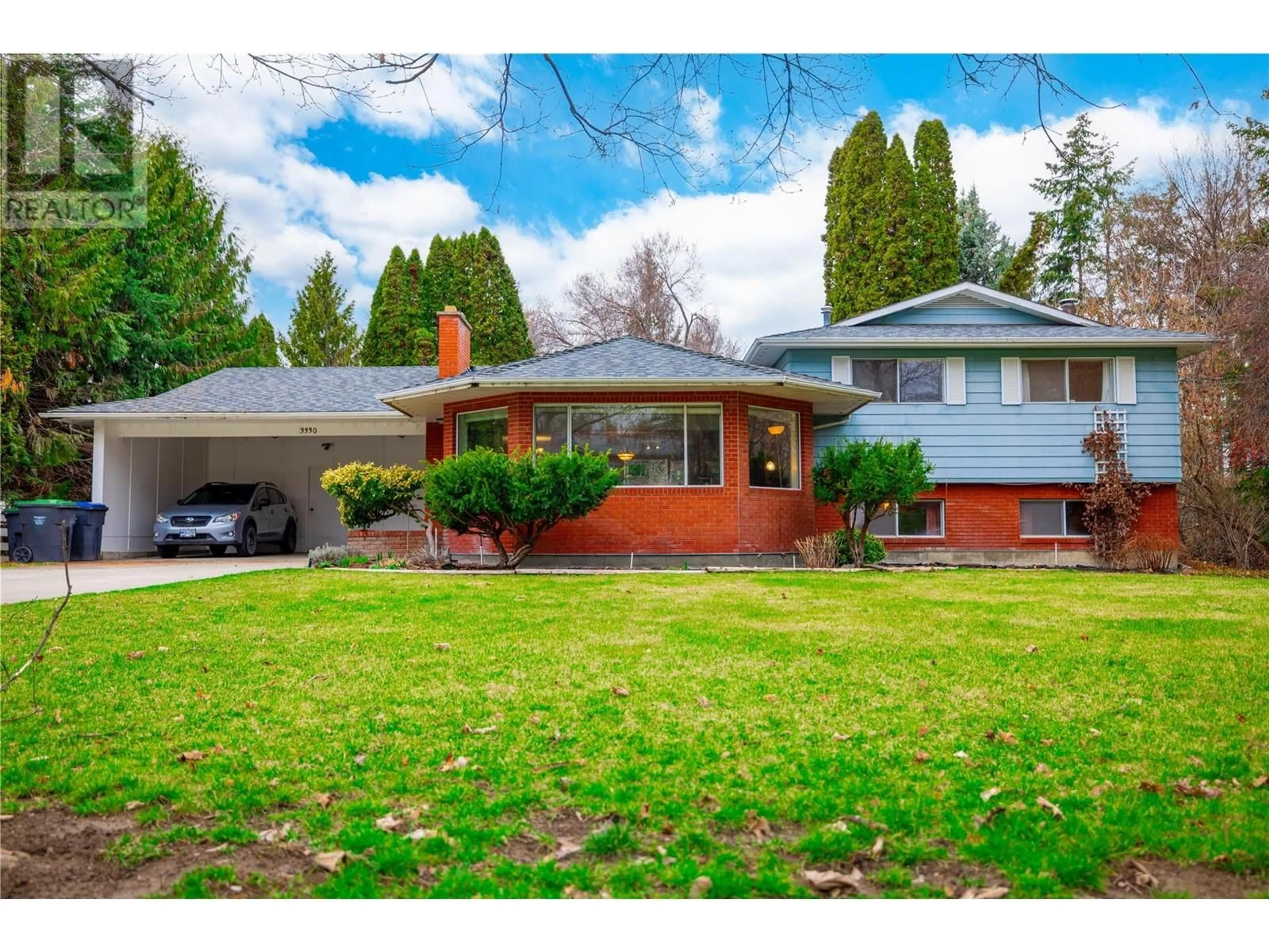 Home with brick exterior material, street for 3330 JACKSON COURT, Kelowna British Columbia V1W2T6