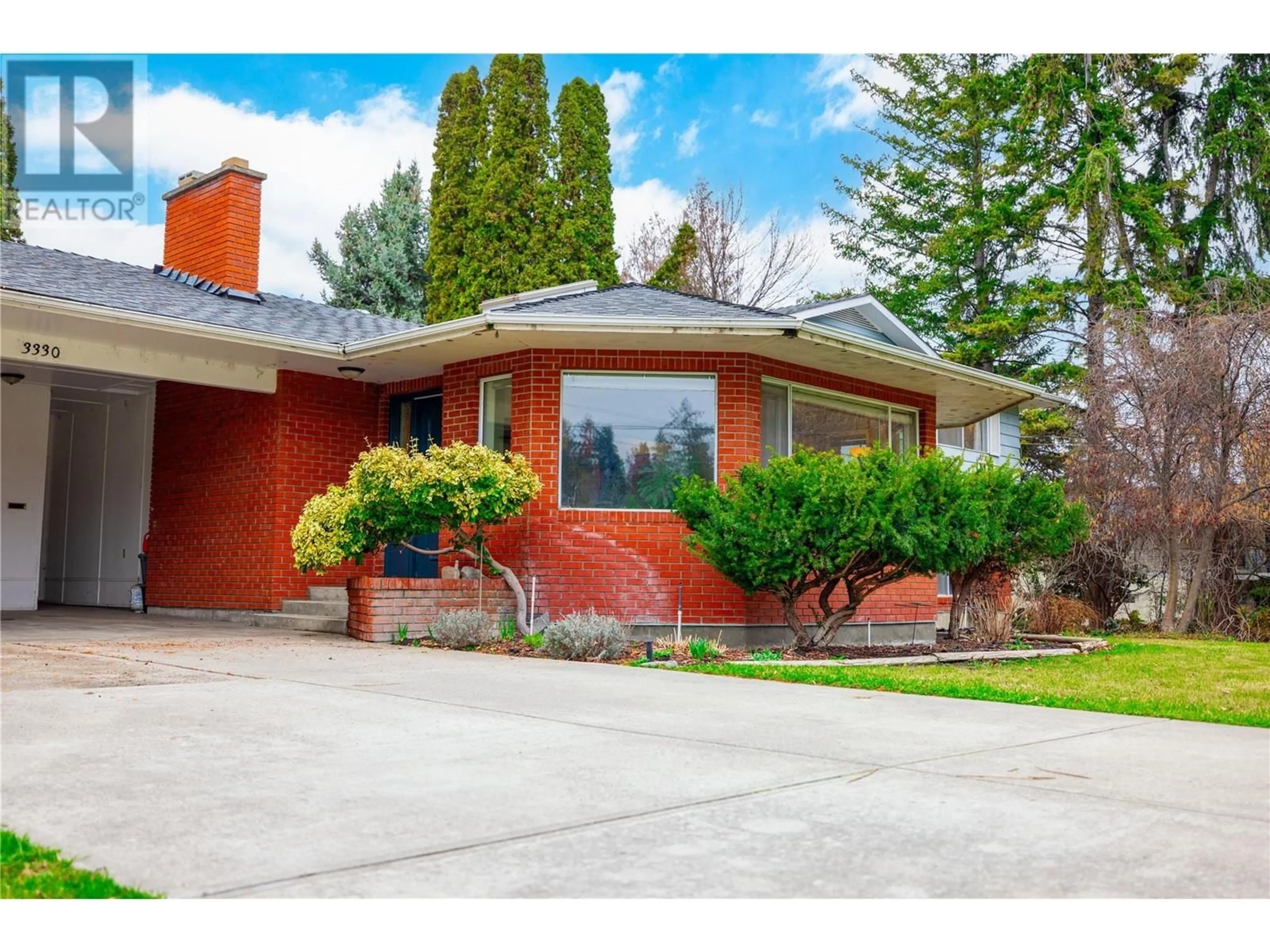 Home with brick exterior material, street for 3330 JACKSON COURT, Kelowna British Columbia V1W2T6