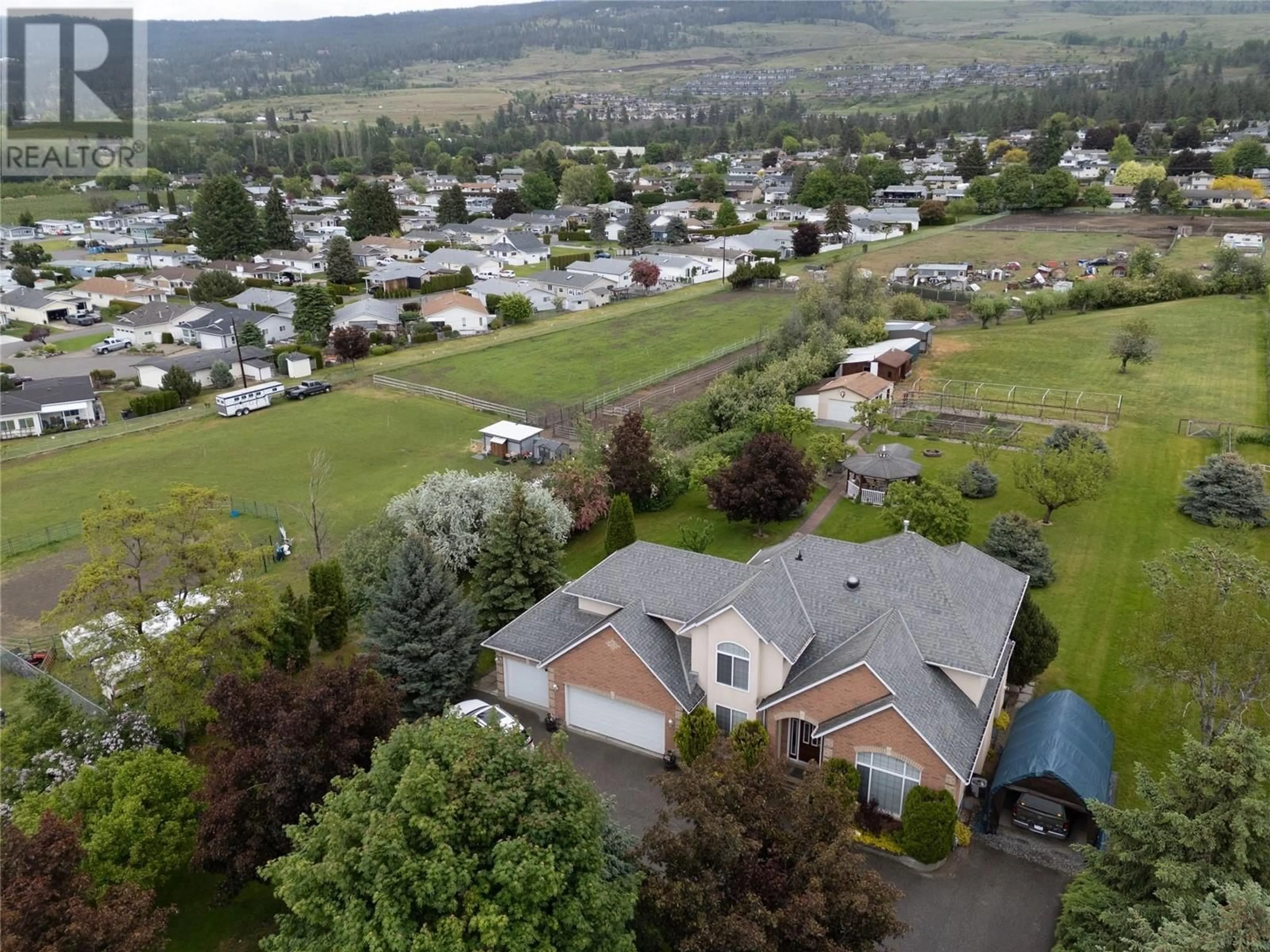 A pic from outside/outdoor area/front of a property/back of a property/a pic from drone, mountain view for 3451 OLD VERNON ROAD, Kelowna British Columbia V1X6P4