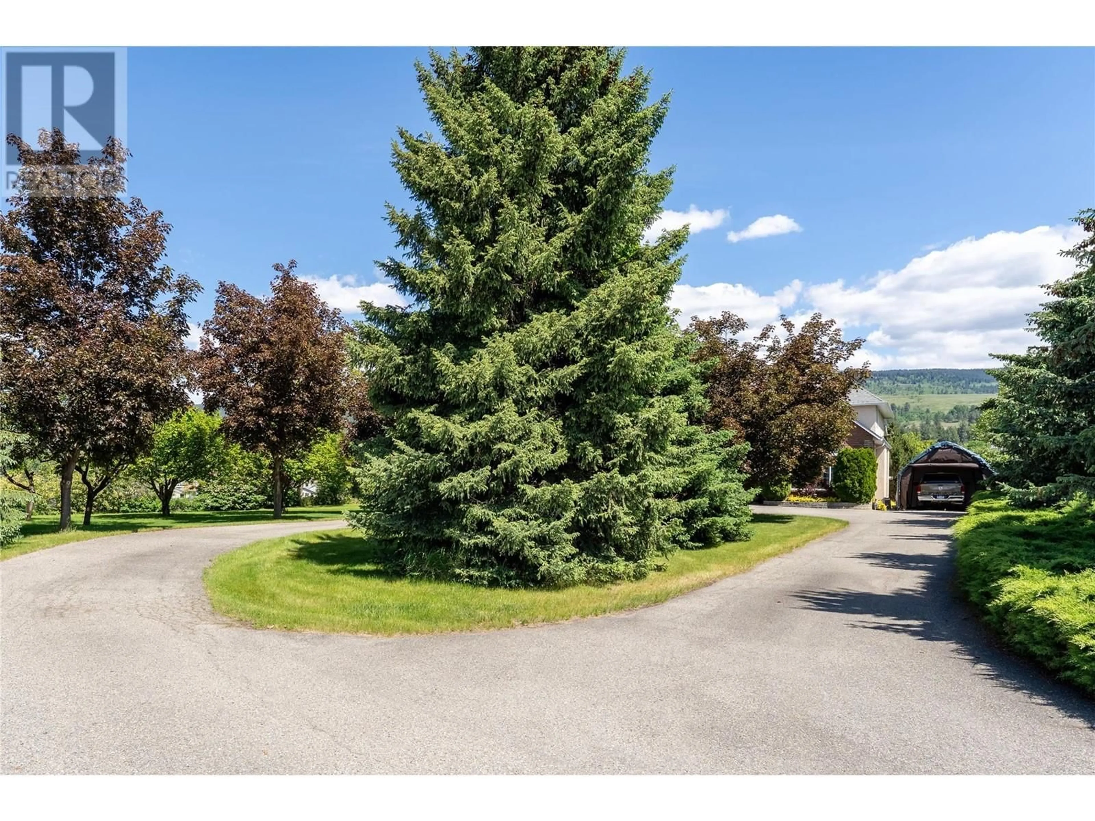 A pic from outside/outdoor area/front of a property/back of a property/a pic from drone, forest/trees view for 3451 OLD VERNON ROAD, Kelowna British Columbia V1X6P4