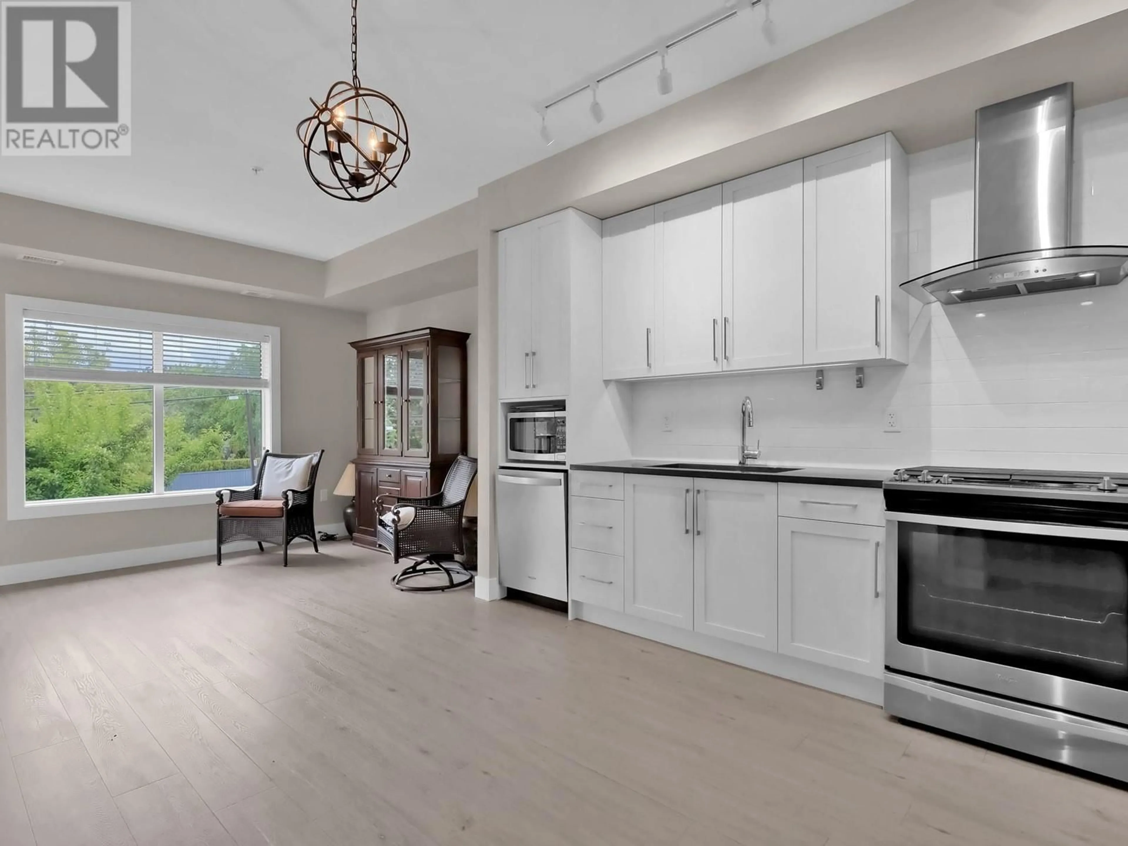 Open concept kitchen, ceramic/tile floor for 219 - 4380 LAKESHORE ROAD, Kelowna British Columbia V1W5N3