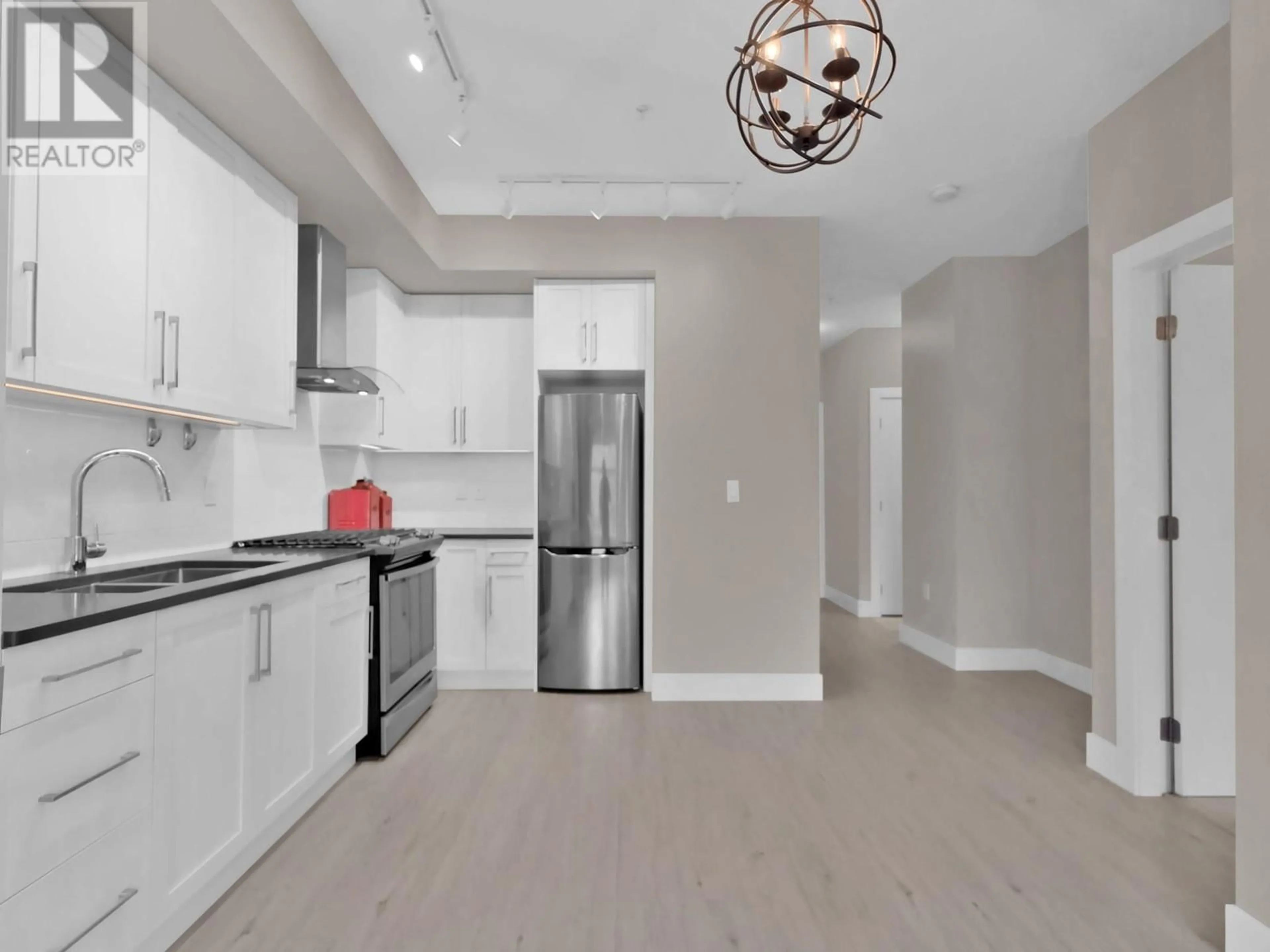 Open concept kitchen, unknown for 219 - 4380 LAKESHORE ROAD, Kelowna British Columbia V1W5N3