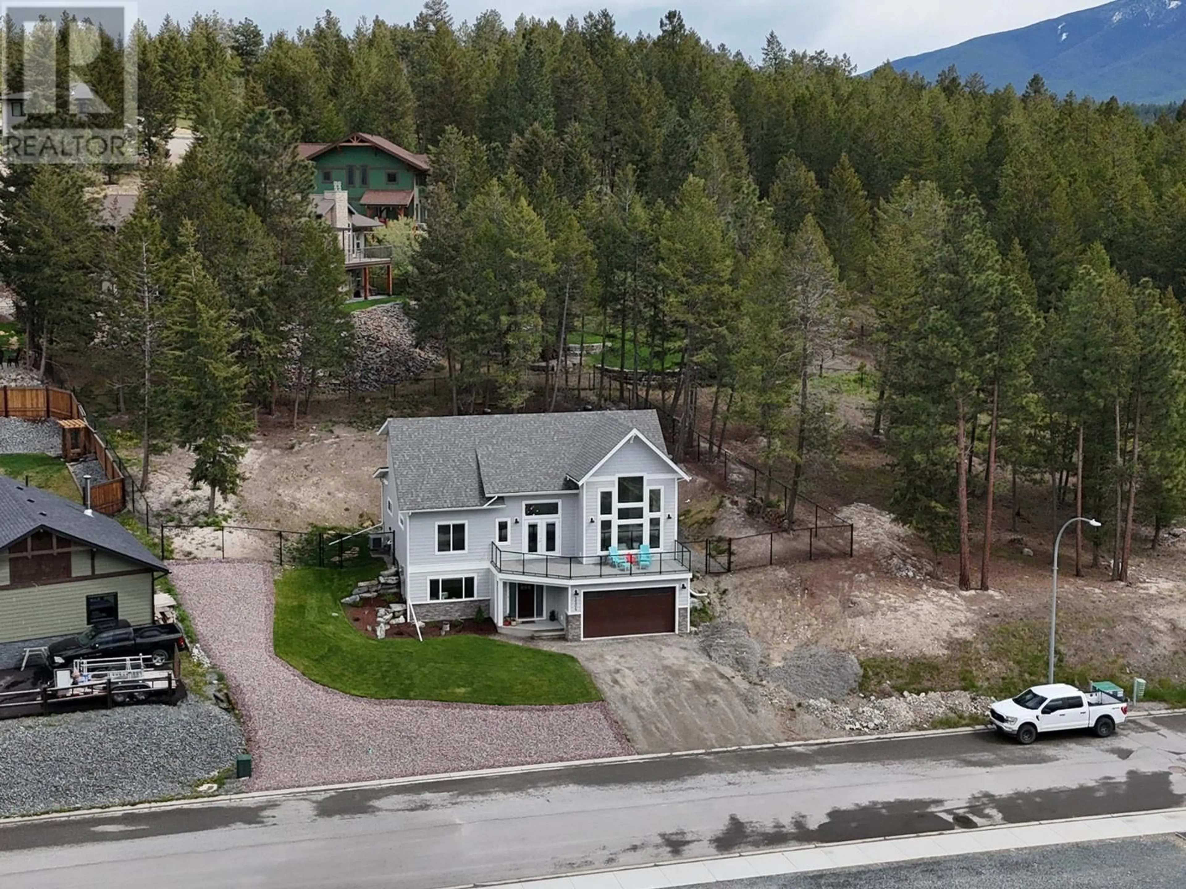 A pic from outside/outdoor area/front of a property/back of a property/a pic from drone, mountain view for 1504 ABEL AVENUE, Cranbrook British Columbia V1C0C4