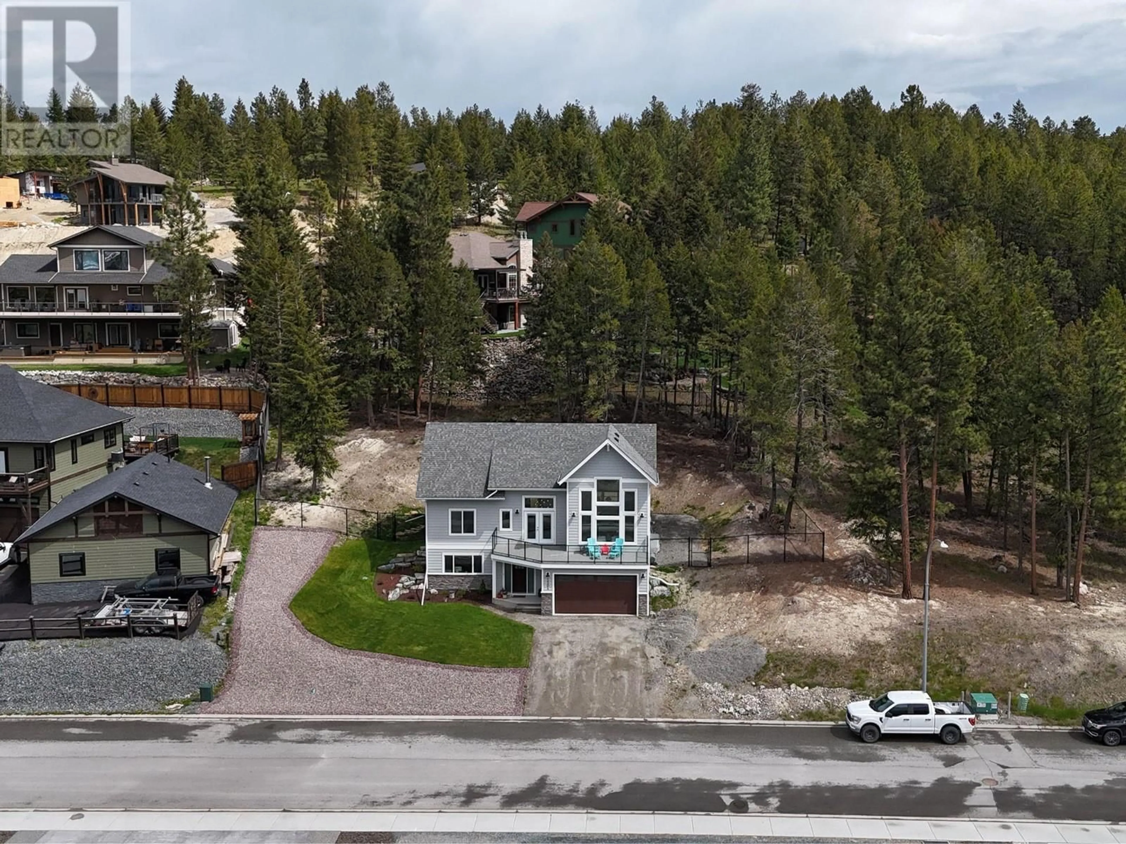 A pic from outside/outdoor area/front of a property/back of a property/a pic from drone, mountain view for 1504 ABEL AVENUE, Cranbrook British Columbia V1C0C4