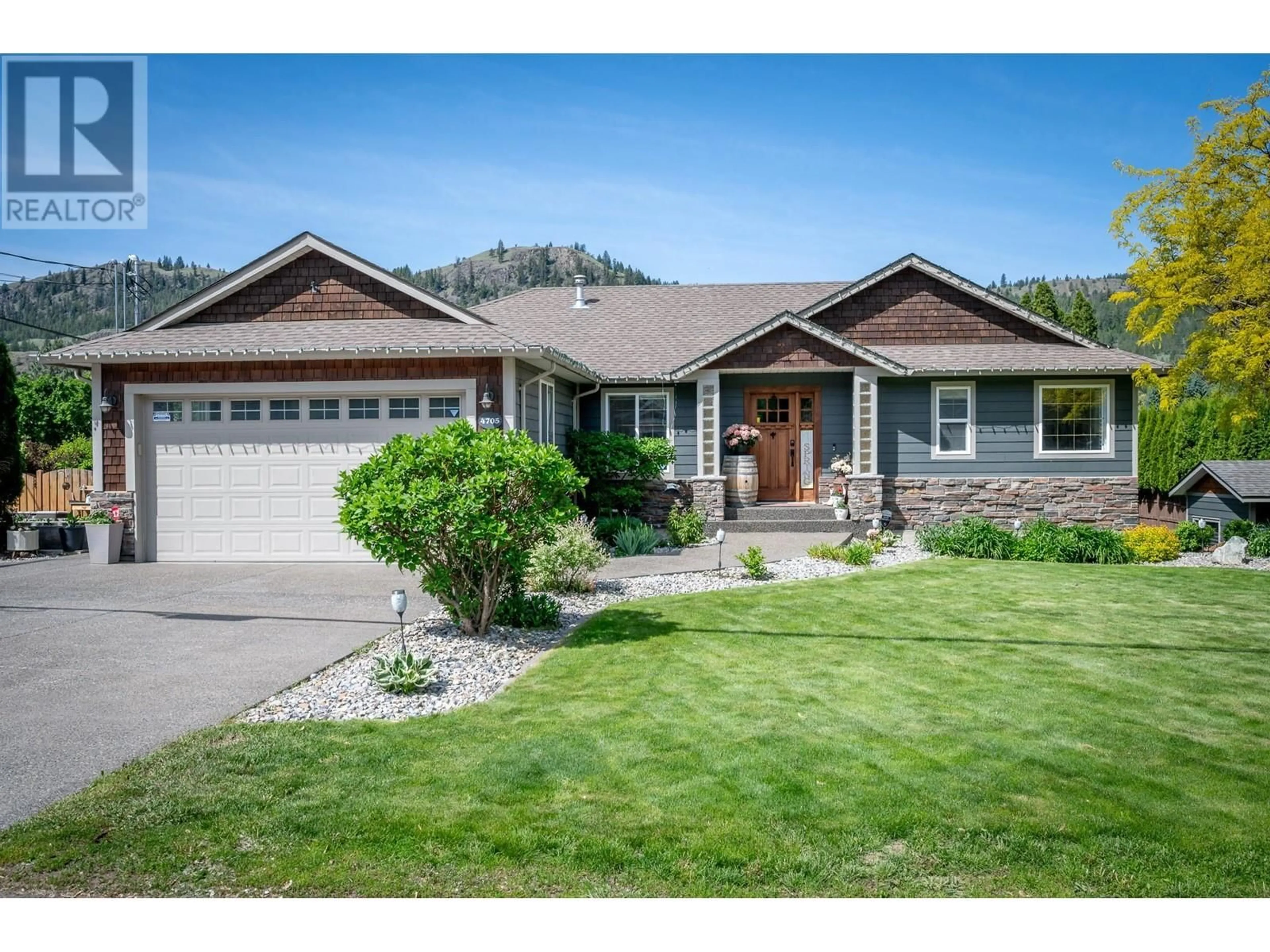 Home with vinyl exterior material, street for 4705 SPURRAWAY ROAD, Kamloops British Columbia V2H1M6