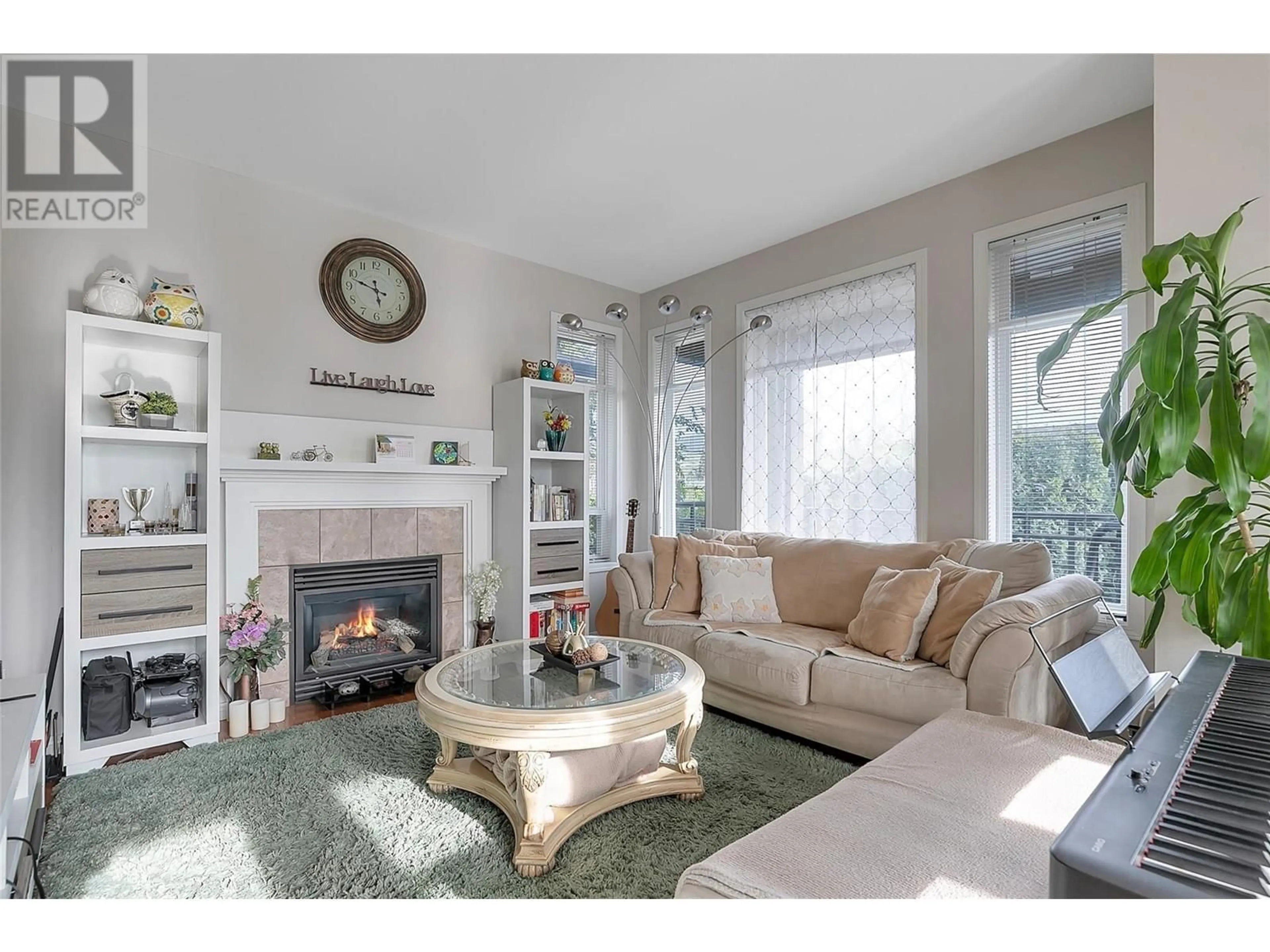 Living room with furniture, unknown for 105 MCCURDY ROAD EAST, Kelowna British Columbia V1X2P7