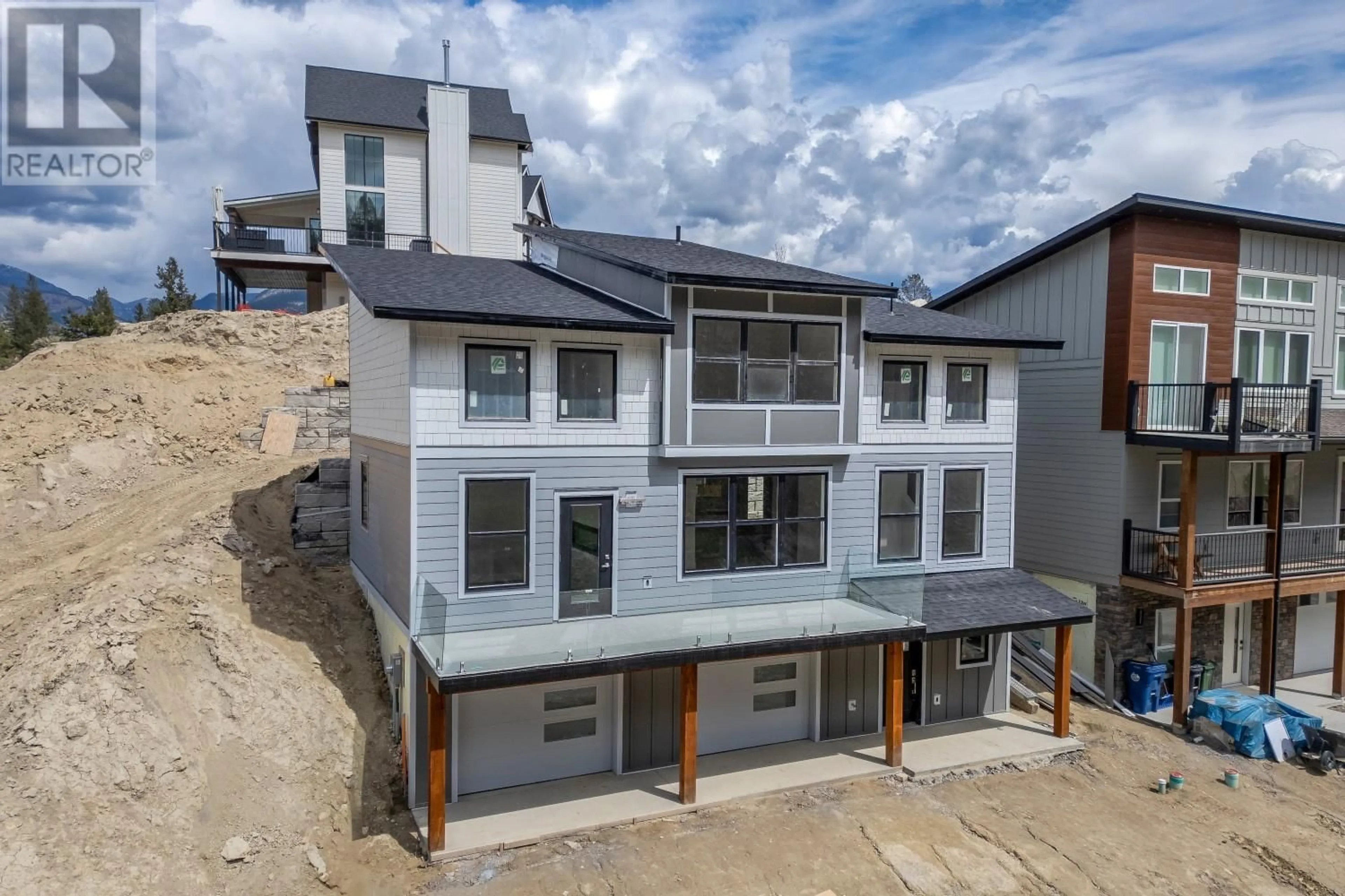 A pic from outside/outdoor area/front of a property/back of a property/a pic from drone, building for 746 TAYNTON DRIVE, Invermere British Columbia V0A1K4