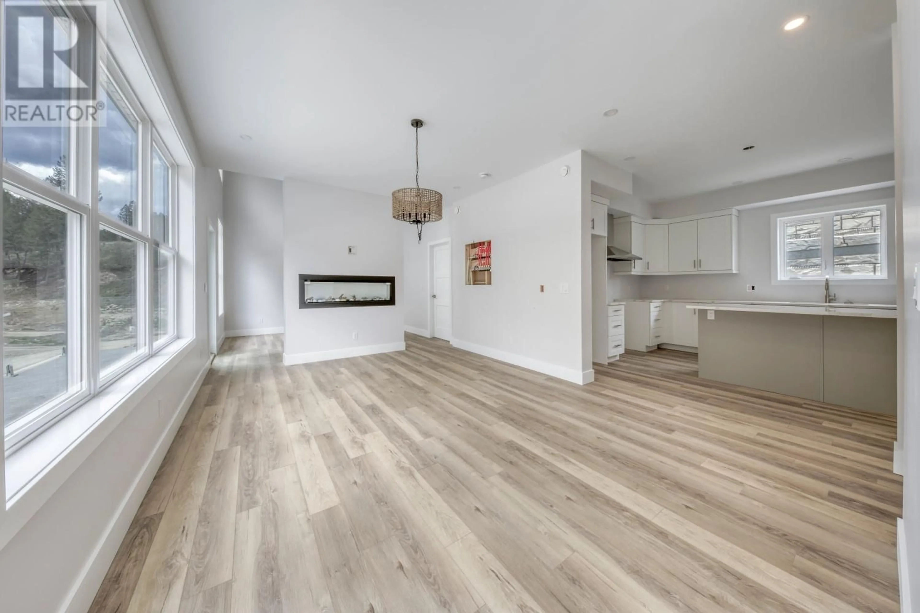 Open concept kitchen, wood/laminate floor for 746 TAYNTON DRIVE, Invermere British Columbia V0A1K4