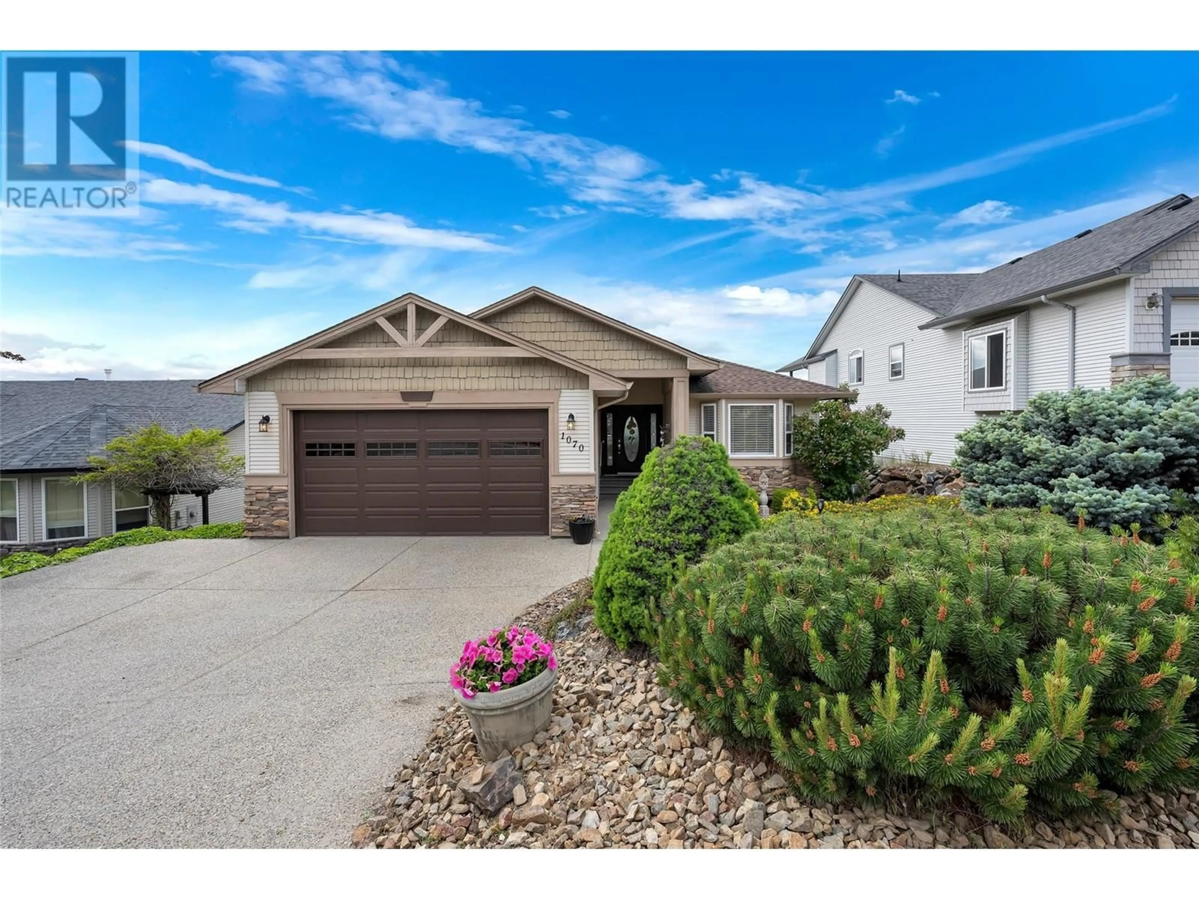 Home with vinyl exterior material, street for 1070 MT FOSTHALL DRIVE, Vernon British Columbia V1B2W2