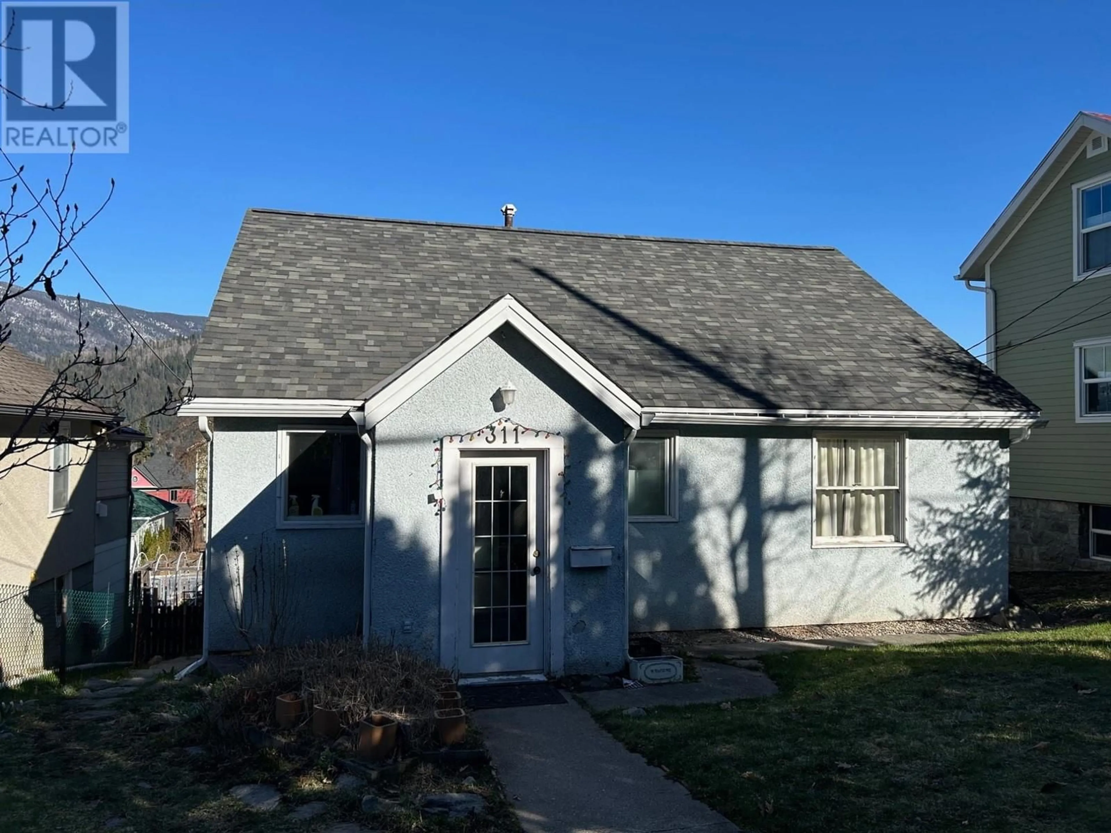 Home with vinyl exterior material, street for 311 GORE STREET, Nelson British Columbia V1L5B8