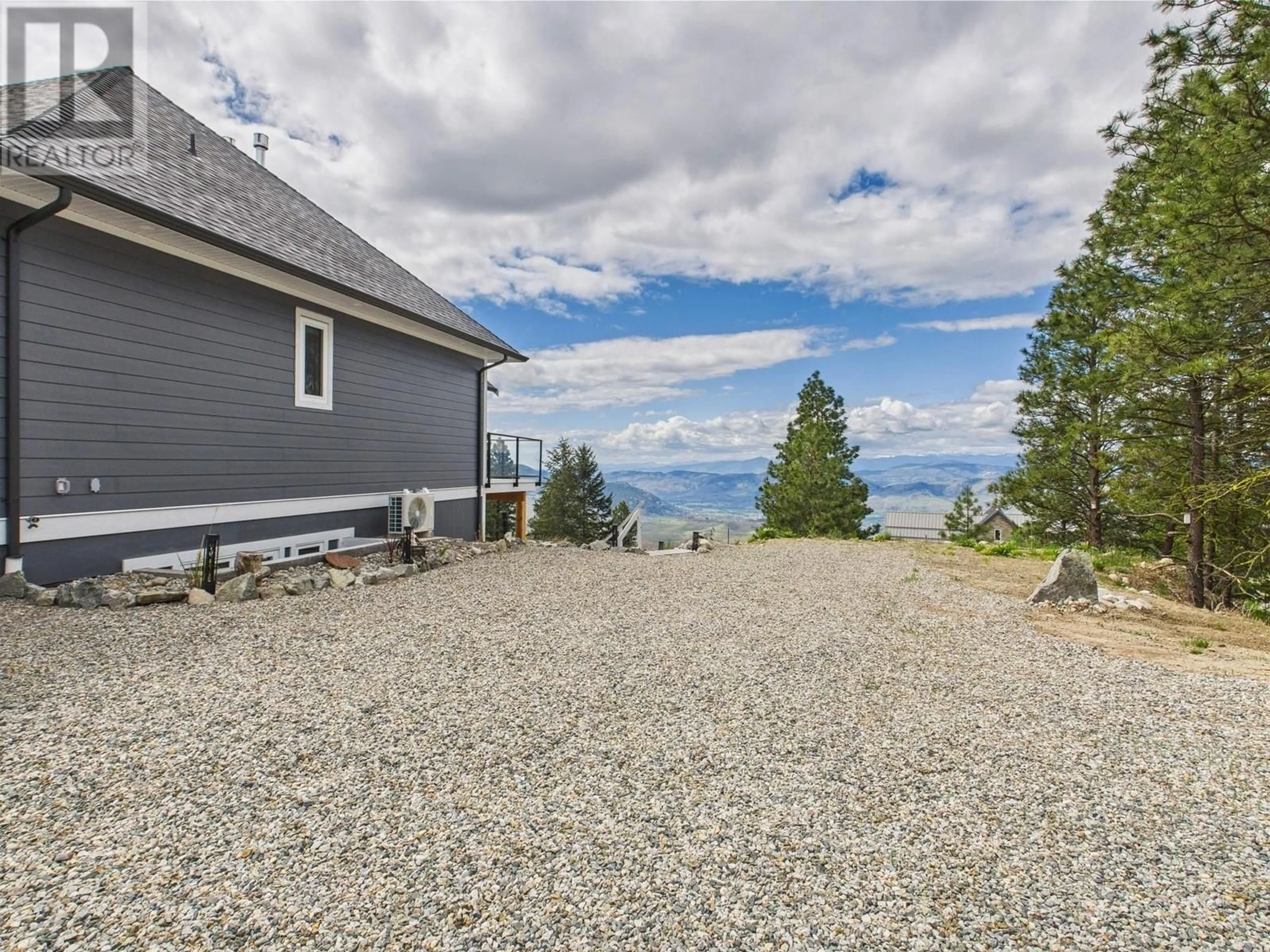 A pic from outside/outdoor area/front of a property/back of a property/a pic from drone, mountain view for 125 FALCON PLACE, Osoyoos British Columbia V0H1V6