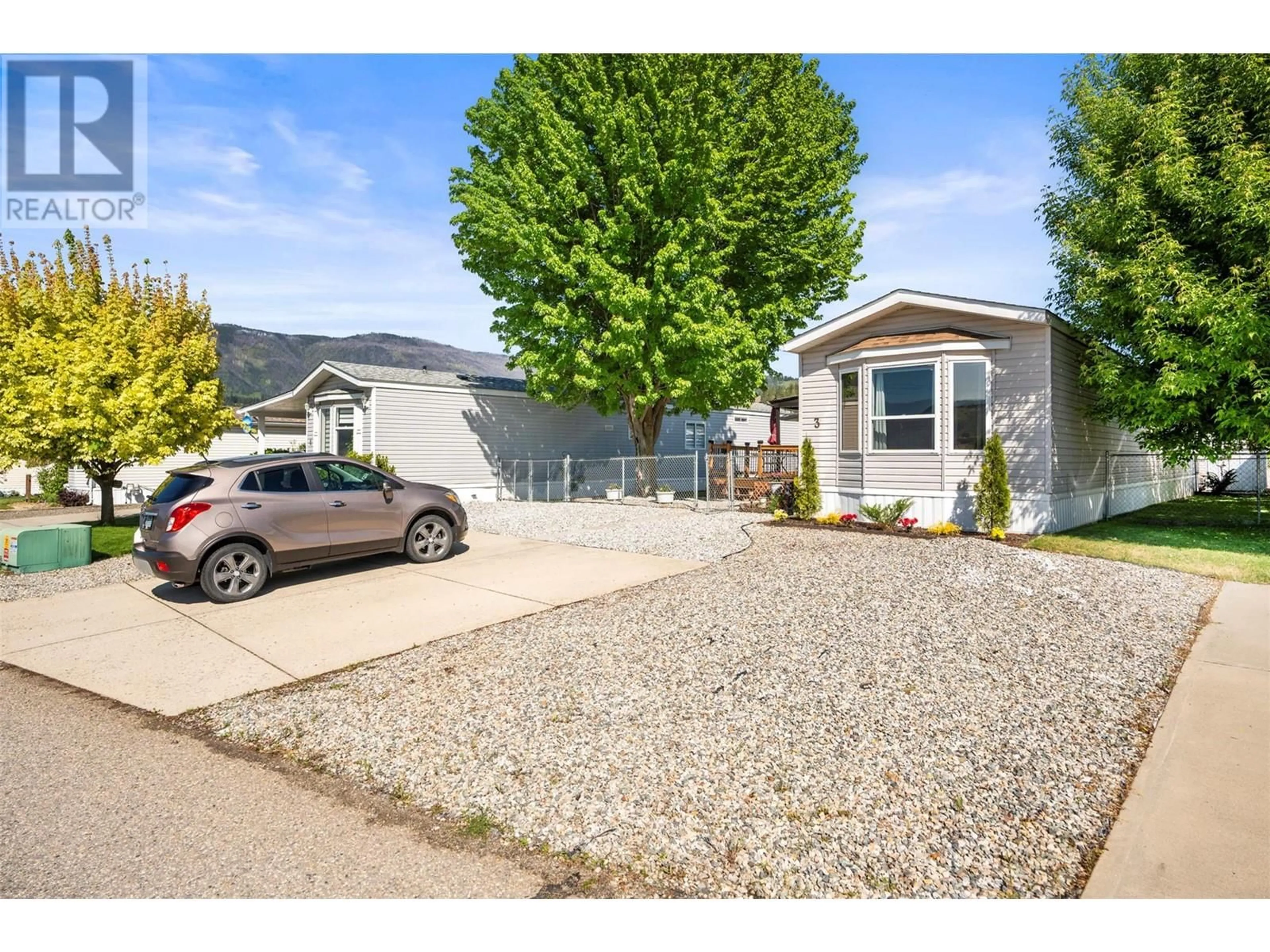 Home with vinyl exterior material, street for 3 - 12560 WESTSIDE ROAD, Vernon British Columbia V1H1S9