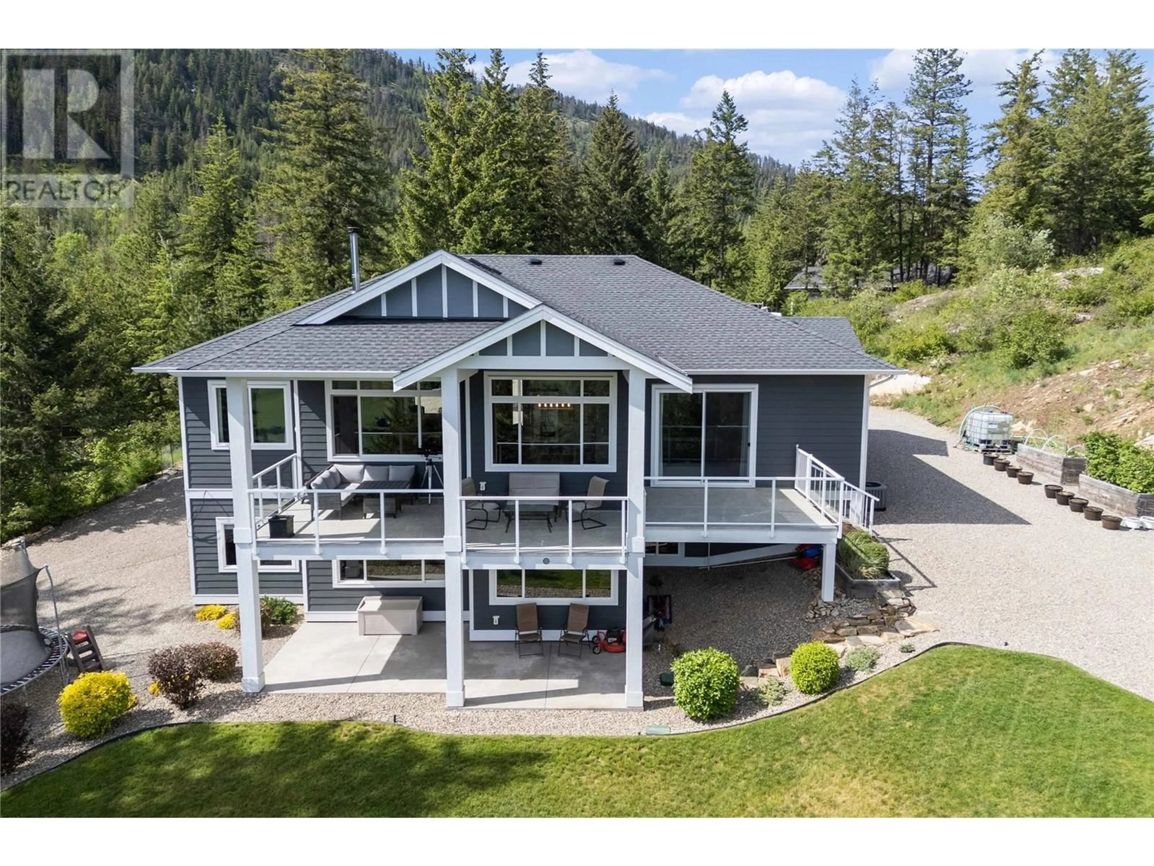 A pic from outside/outdoor area/front of a property/back of a property/a pic from drone, mountain view for 1750 RECLINE RIDGE ROAD, Tappen British Columbia V0E2X0