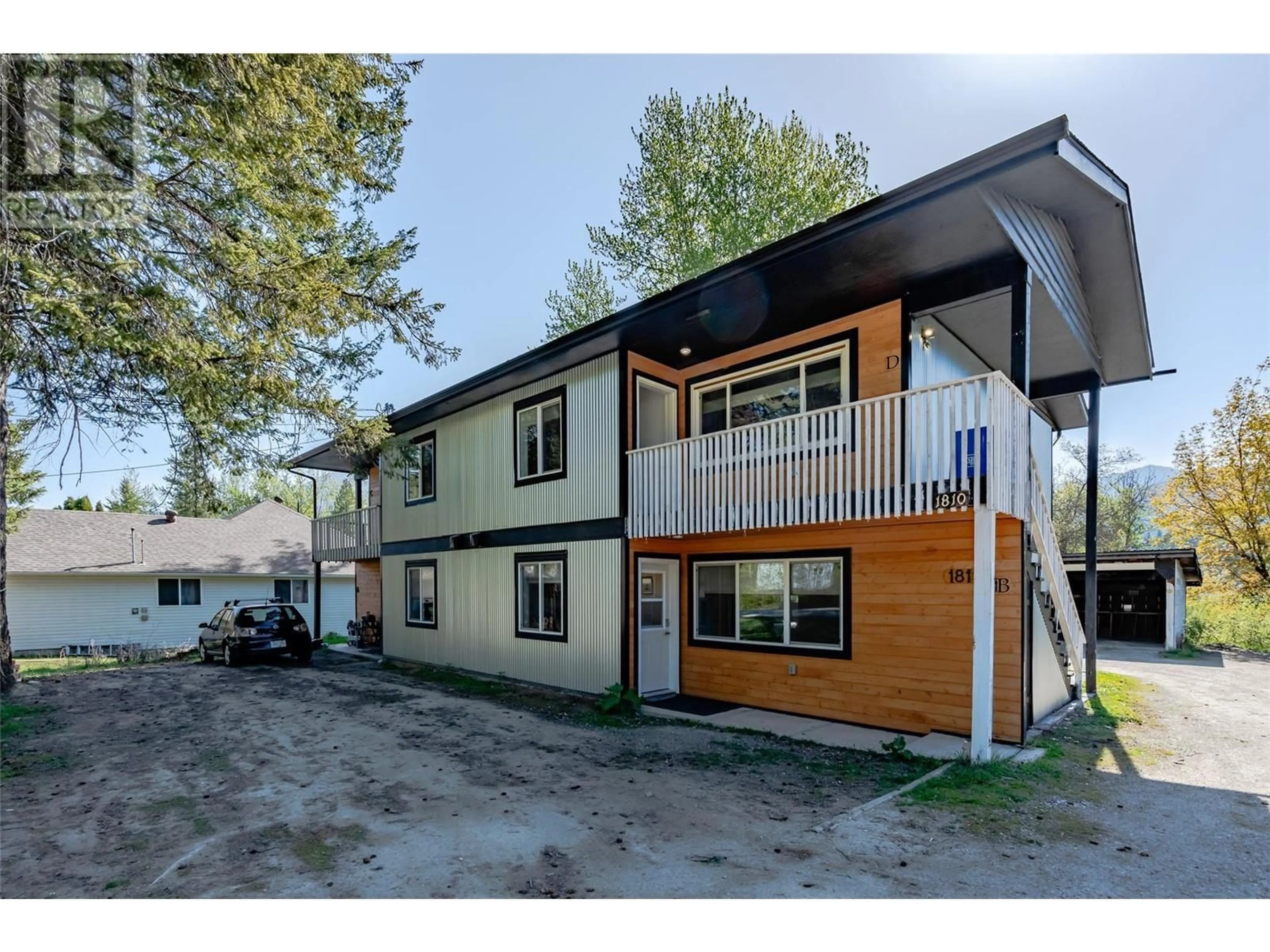 Home with vinyl exterior material, street for 1810 FIRST STREET, Fruitvale British Columbia V0G1L0