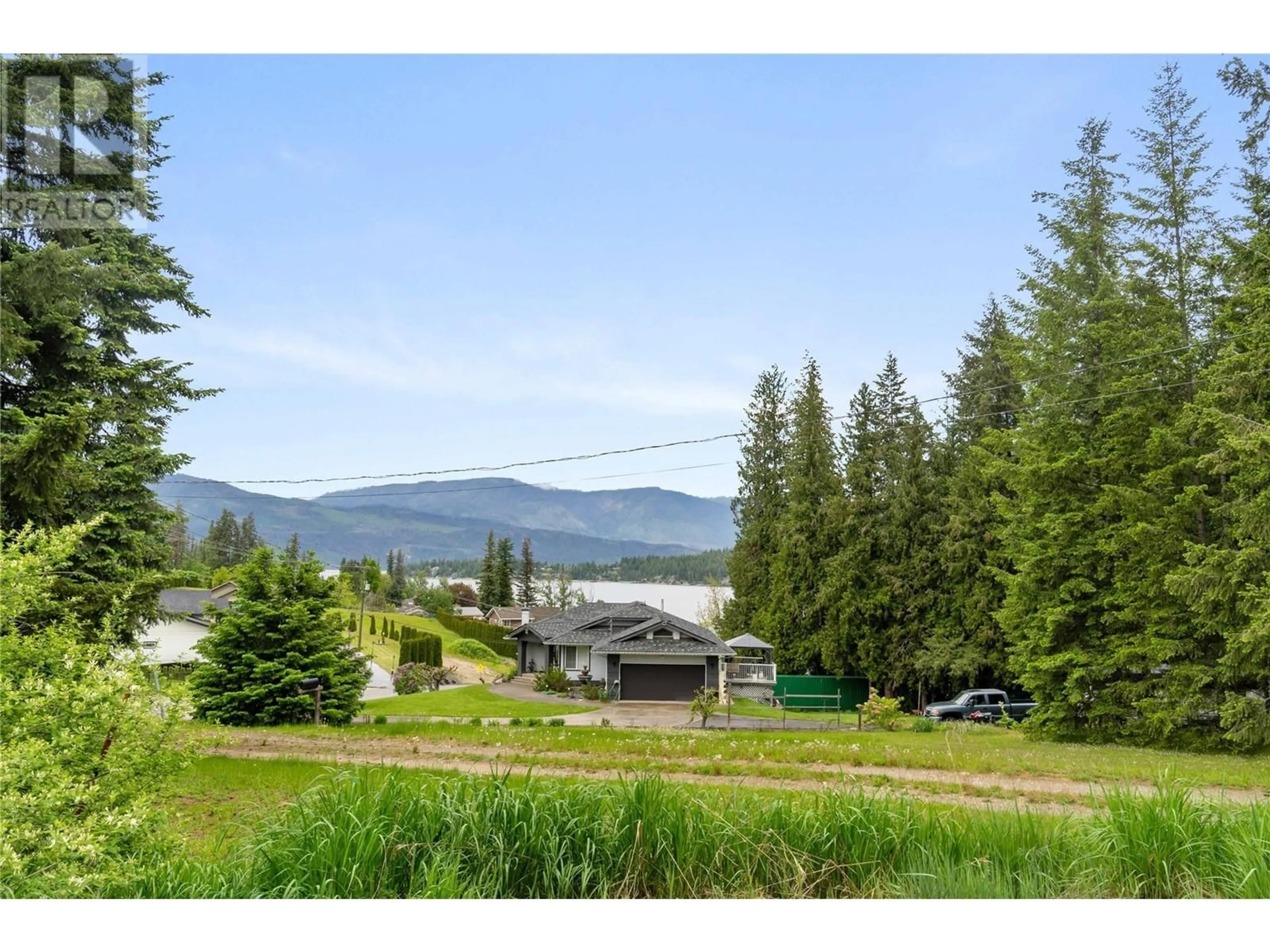 A pic from outside/outdoor area/front of a property/back of a property/a pic from drone, mountain view for 2844 MARINE DRIVE, Blind Bay British Columbia V0E1H1