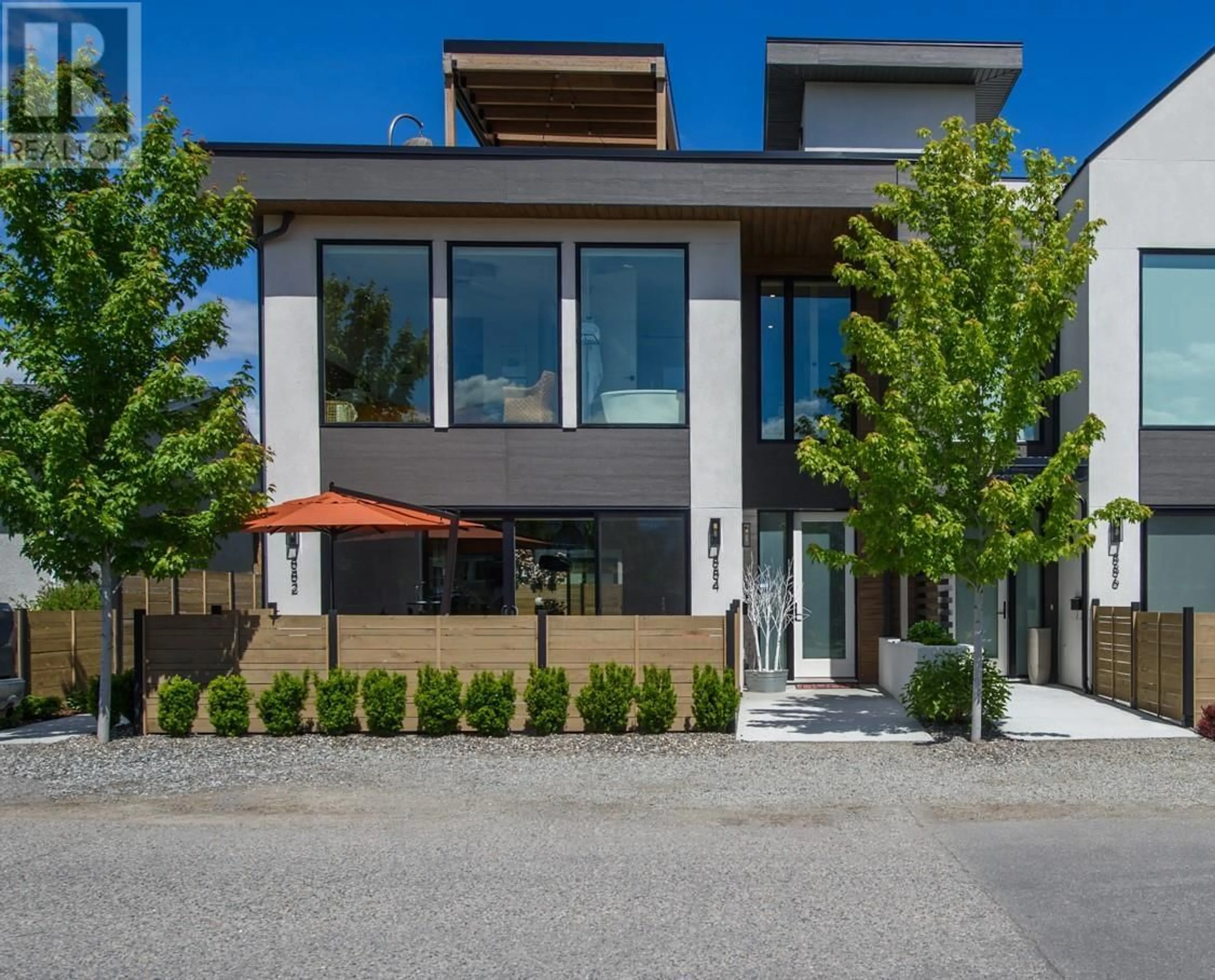 Home with brick exterior material, street for 884 PATTERSON AVENUE, Kelowna British Columbia V1Y7Z3
