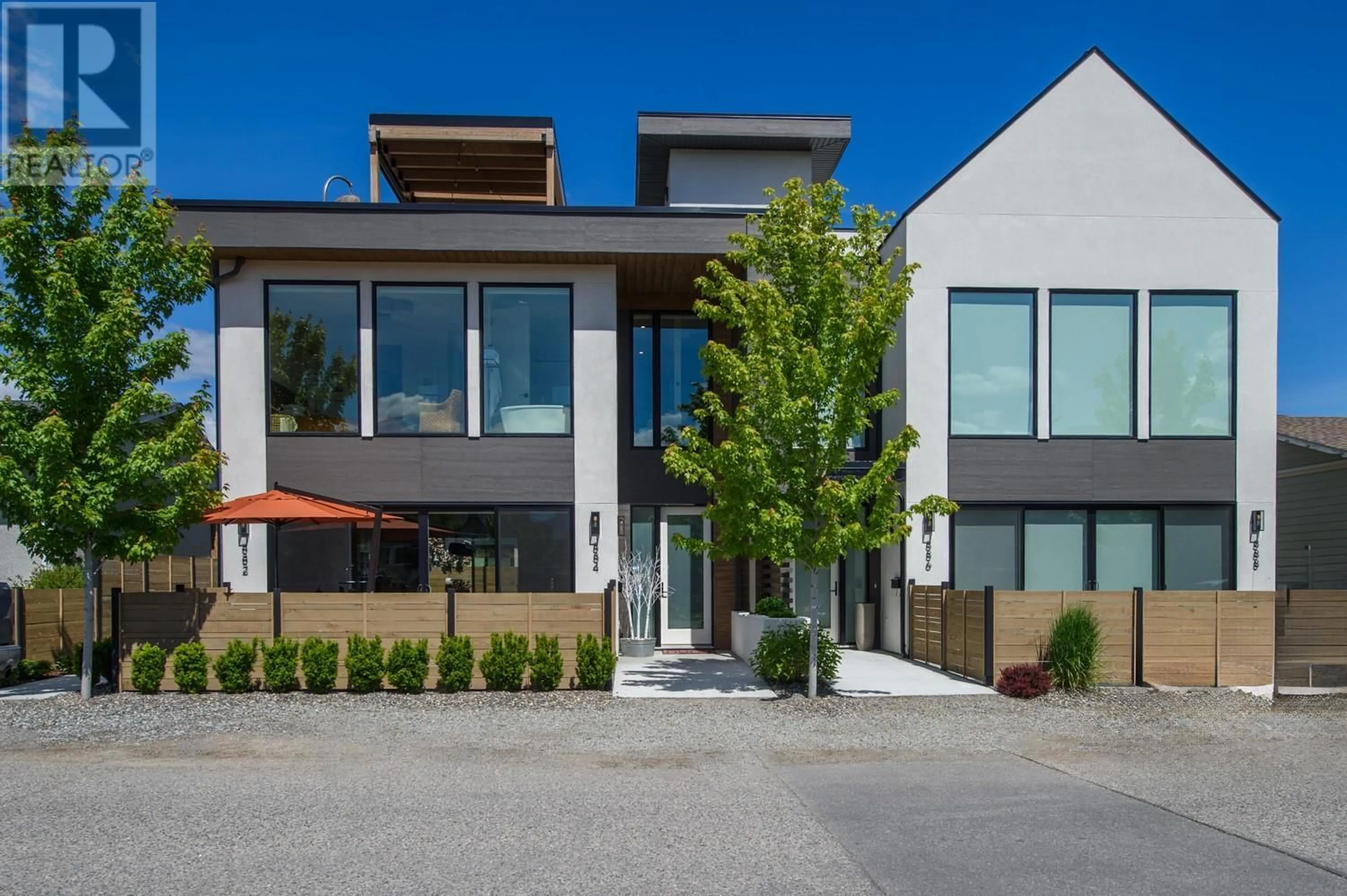 Home with brick exterior material, street for 884 PATTERSON AVENUE, Kelowna British Columbia V1Y7Z3