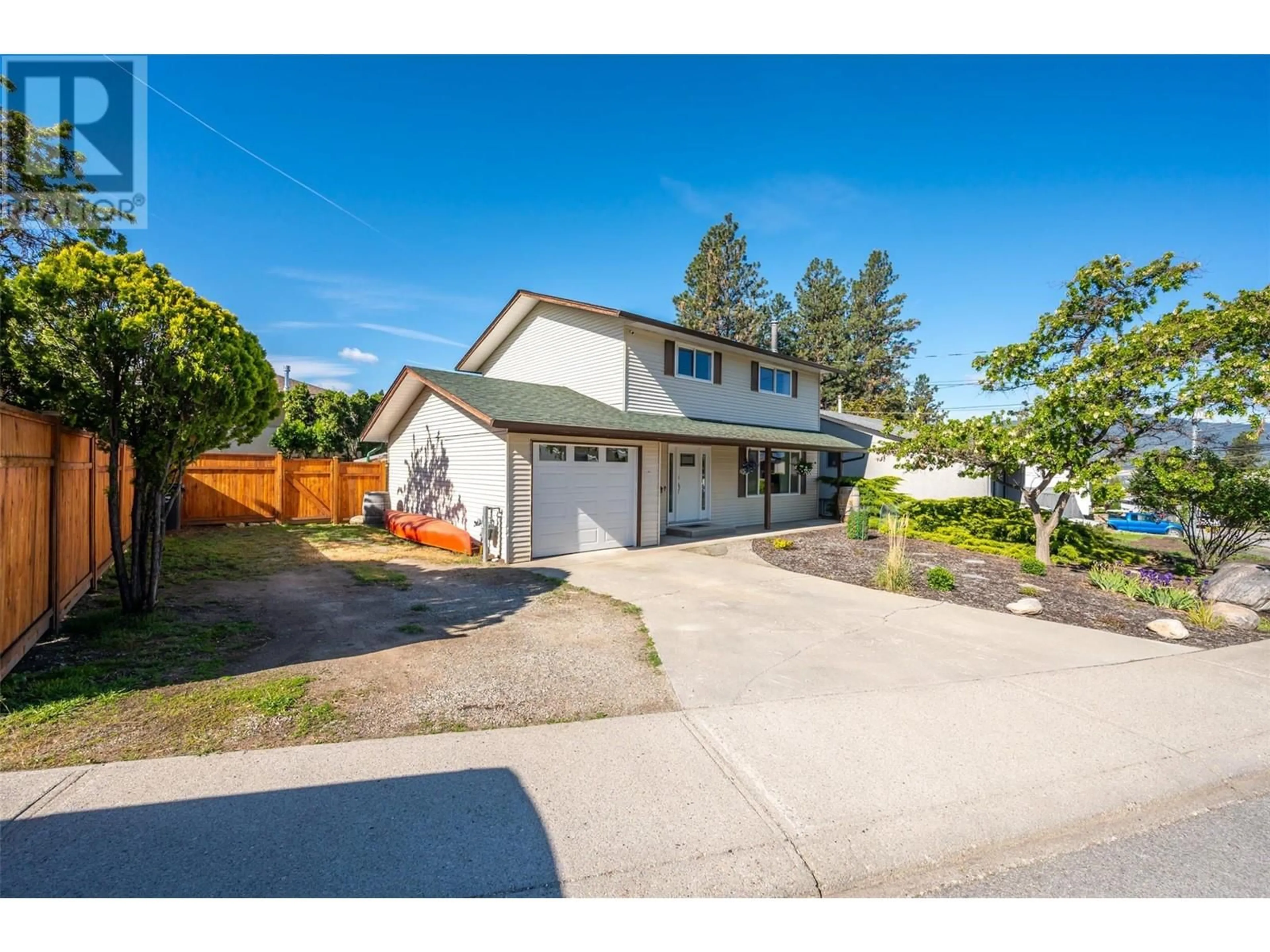 A pic from outside/outdoor area/front of a property/back of a property/a pic from drone, street for 1626 CARMI AVENUE, Penticton British Columbia V2A6M8