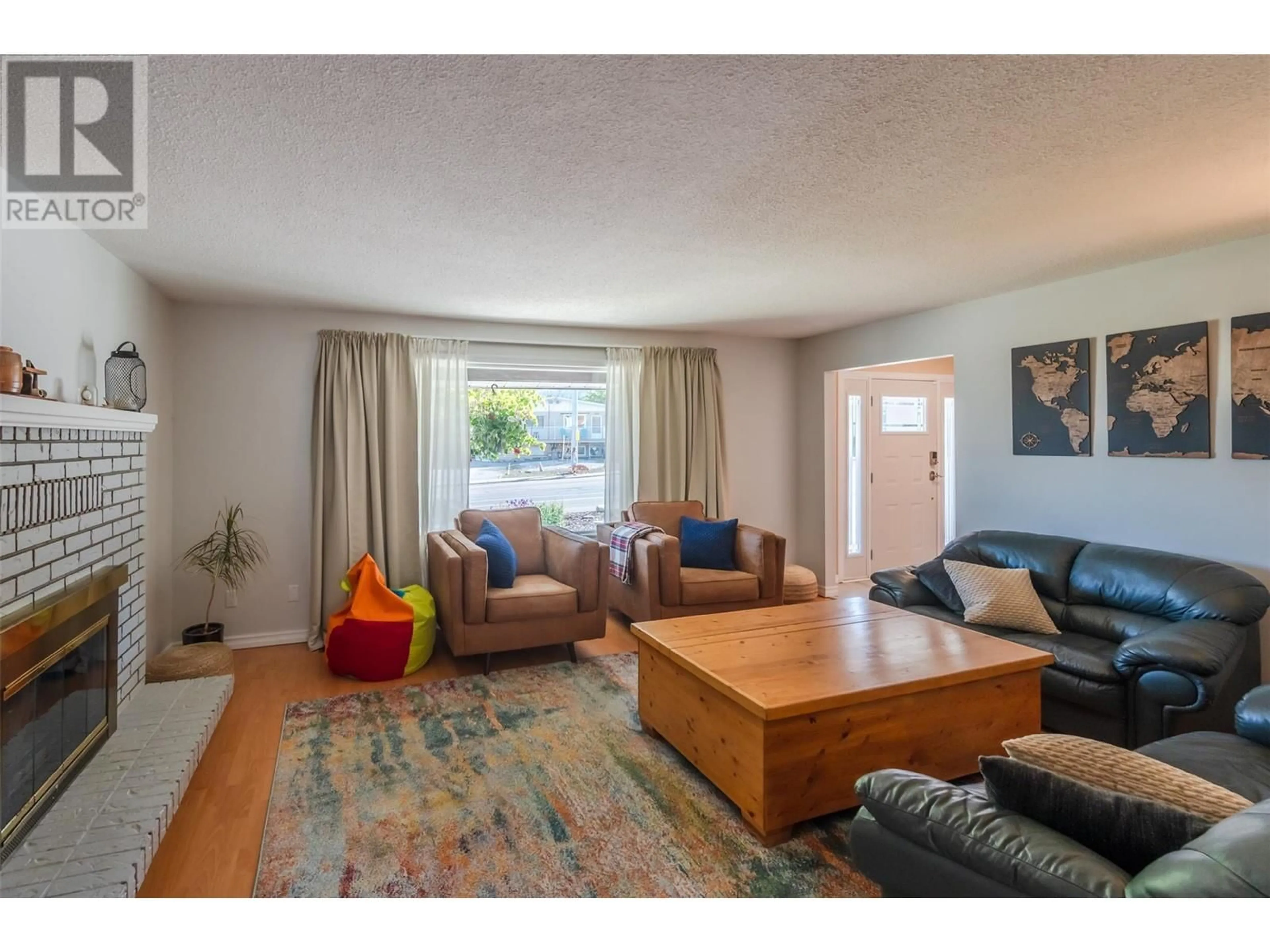 Living room with furniture, unknown for 1626 CARMI AVENUE, Penticton British Columbia V2A6M8