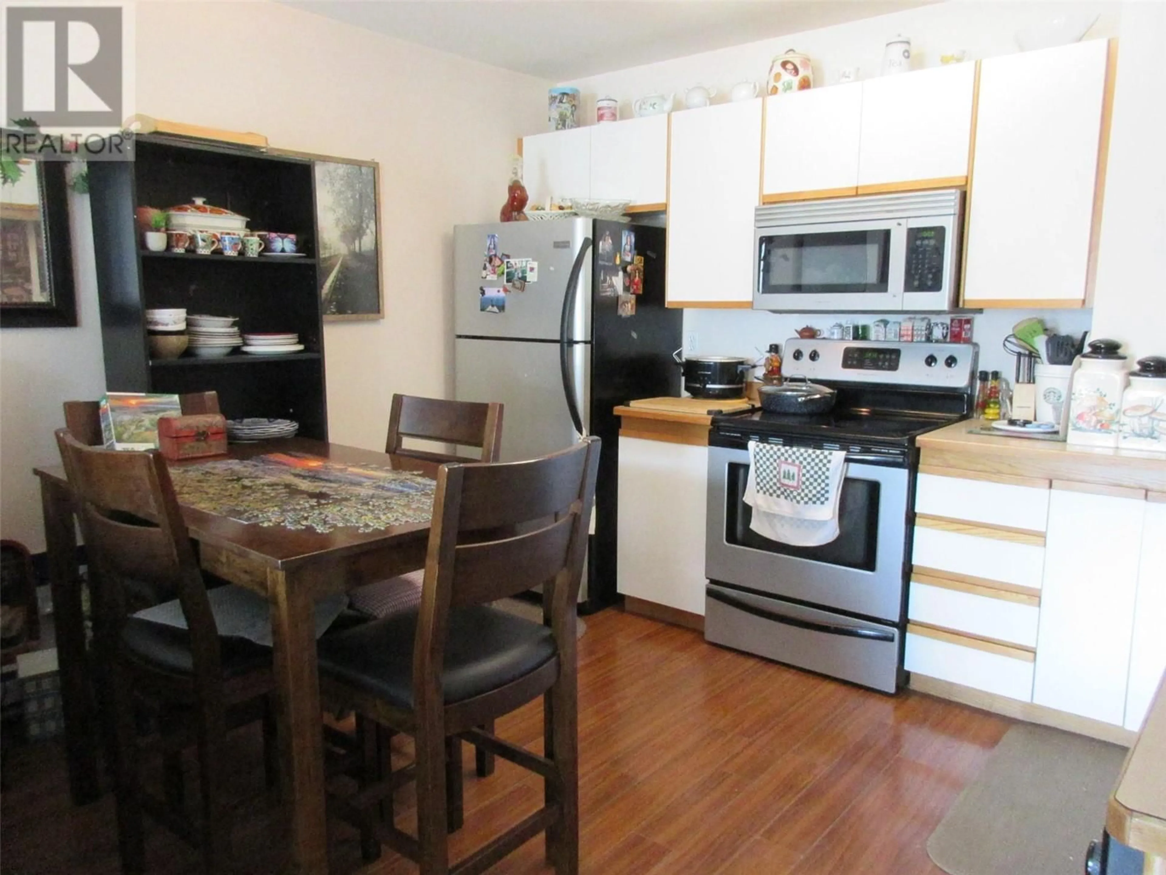 Standard kitchen, wood/laminate floor for 109 - 2295 BLAIR STREET, Merritt British Columbia V1K1B8