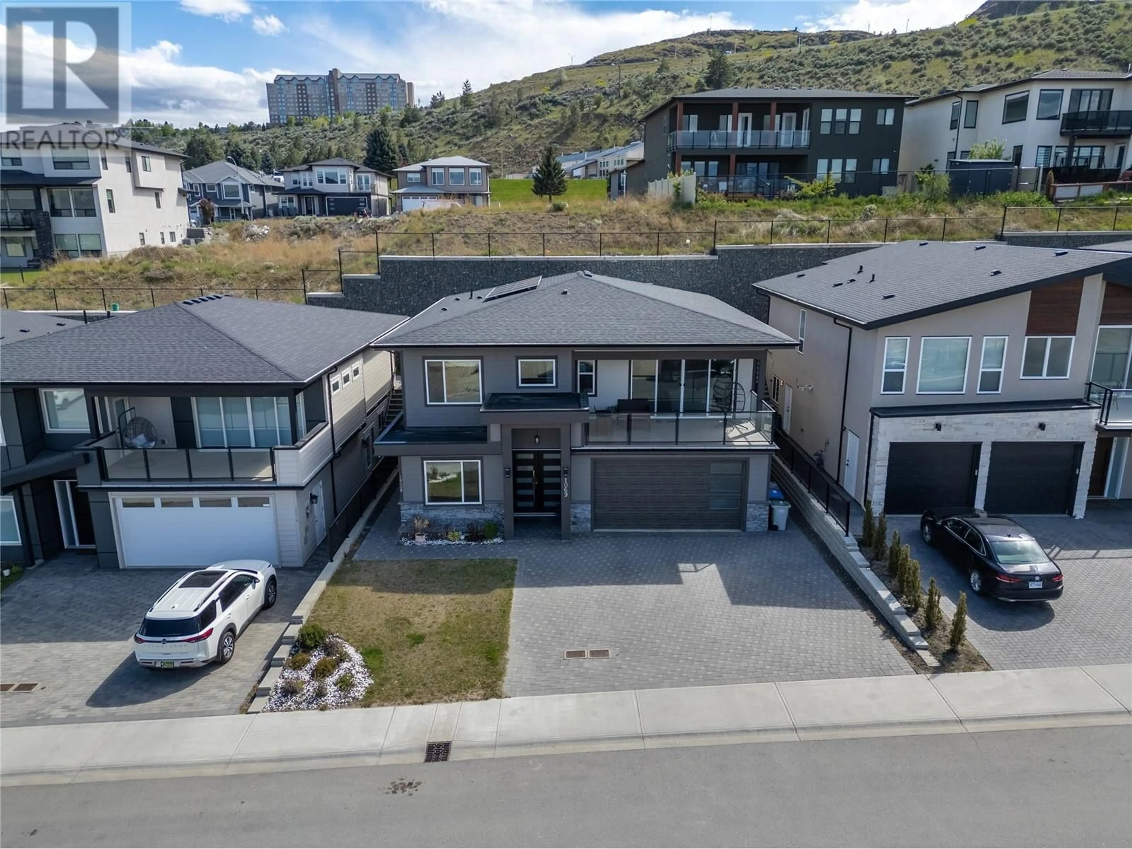 A pic from outside/outdoor area/front of a property/back of a property/a pic from drone, mountain view for 1069 FORDEN PLACE, Kamloops British Columbia V2C0G6