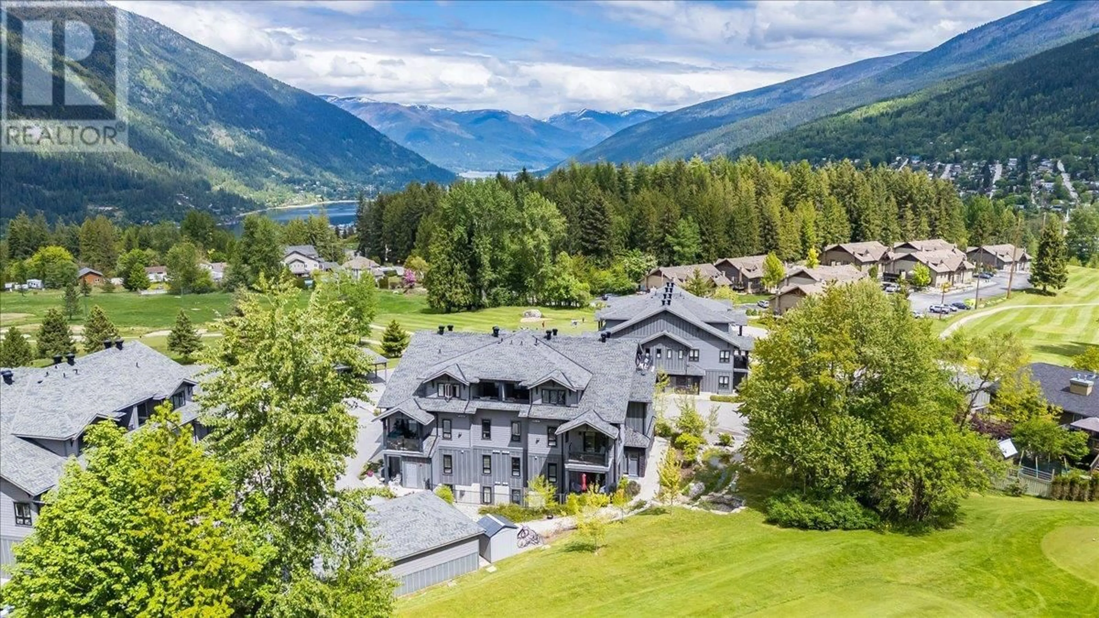 A pic from outside/outdoor area/front of a property/back of a property/a pic from drone, mountain view for 207 - 2000 CHOQUETTE AVENUE, Nelson British Columbia V1L7E4