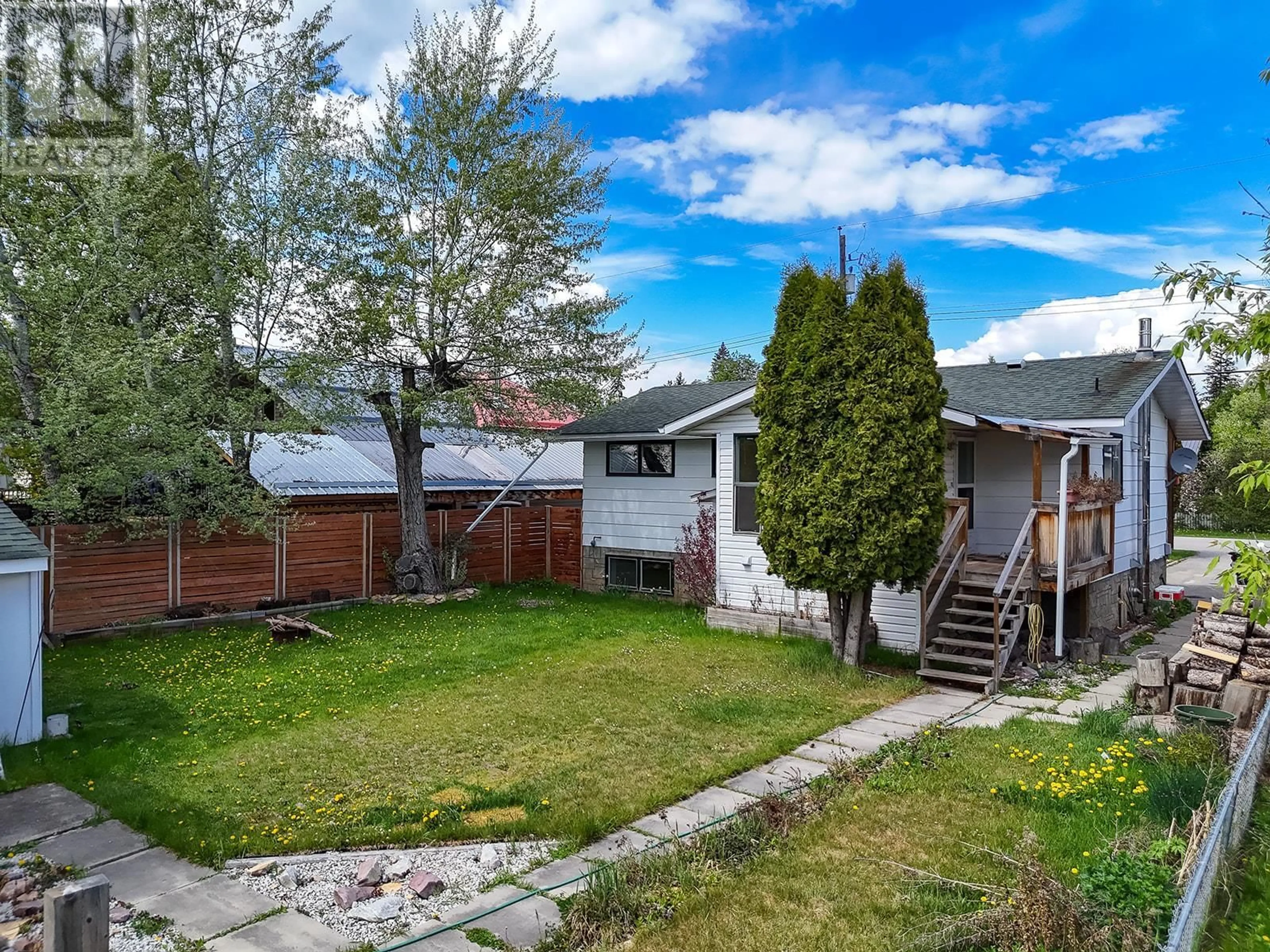 A pic from outside/outdoor area/front of a property/back of a property/a pic from drone, street for 710 8TH STREET, Golden British Columbia V0A1H0