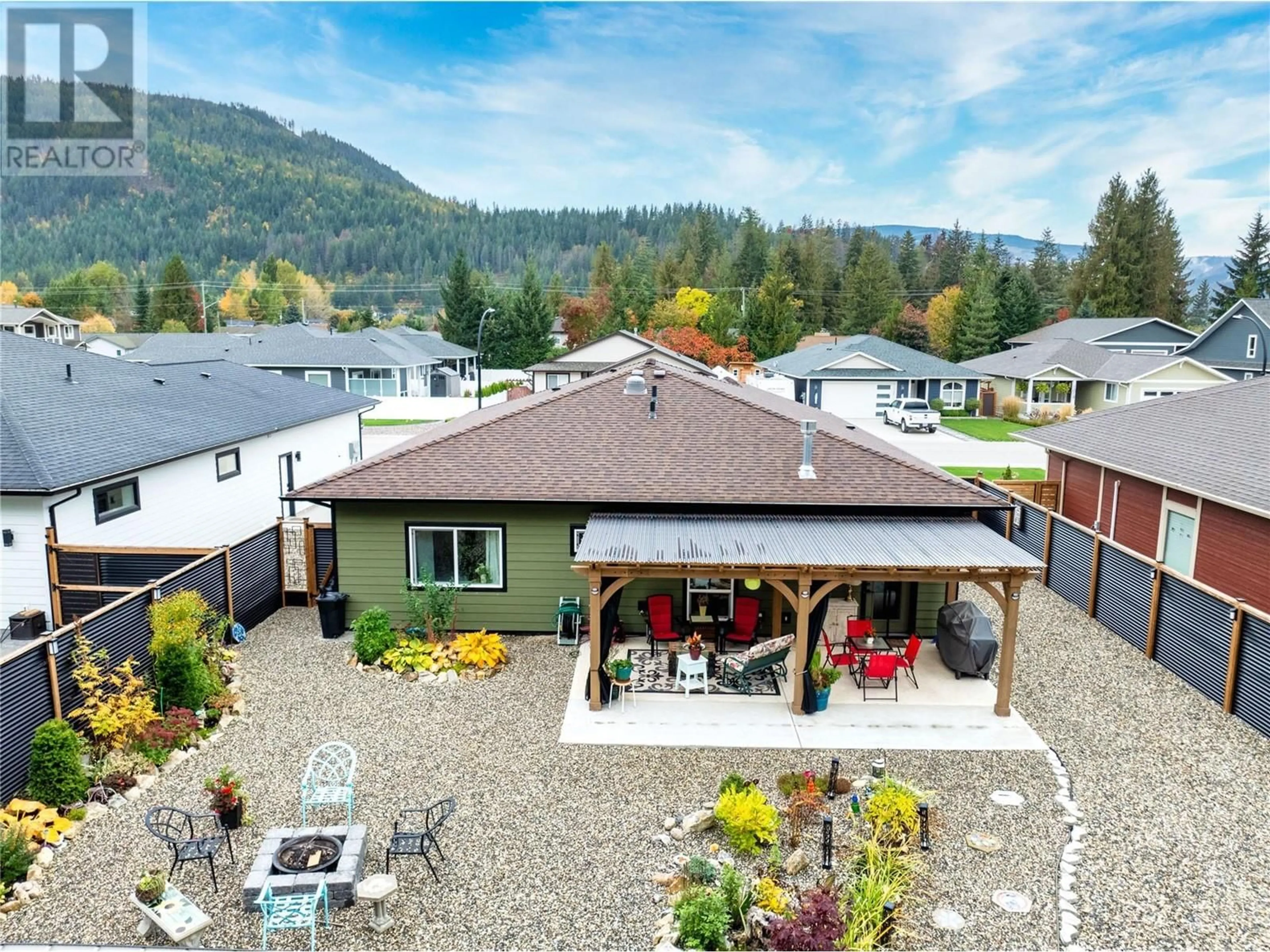 A pic from outside/outdoor area/front of a property/back of a property/a pic from drone, mountain view for 1009 HEMLOCK CRESCENT NORTH, Sicamous British Columbia V0E2V1