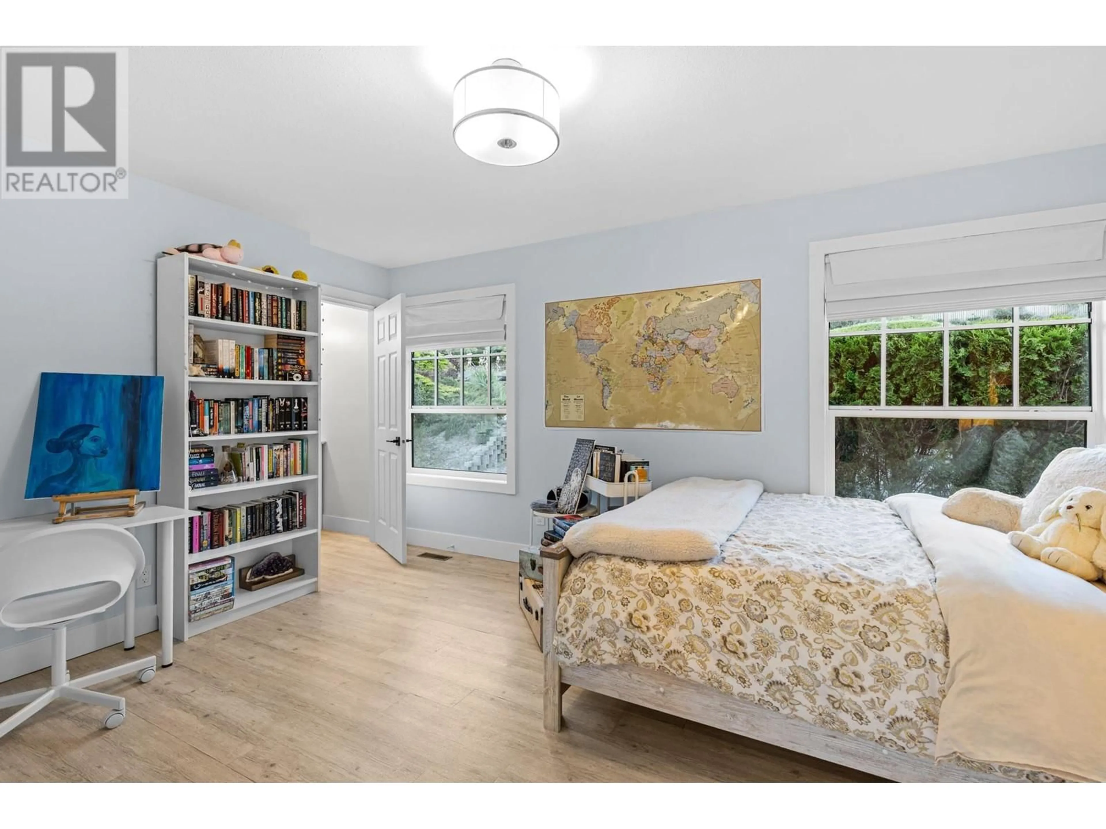 Bedroom with bed, wood/laminate floor for 3895 ANGUS DRIVE, West Kelowna British Columbia V4T2J8
