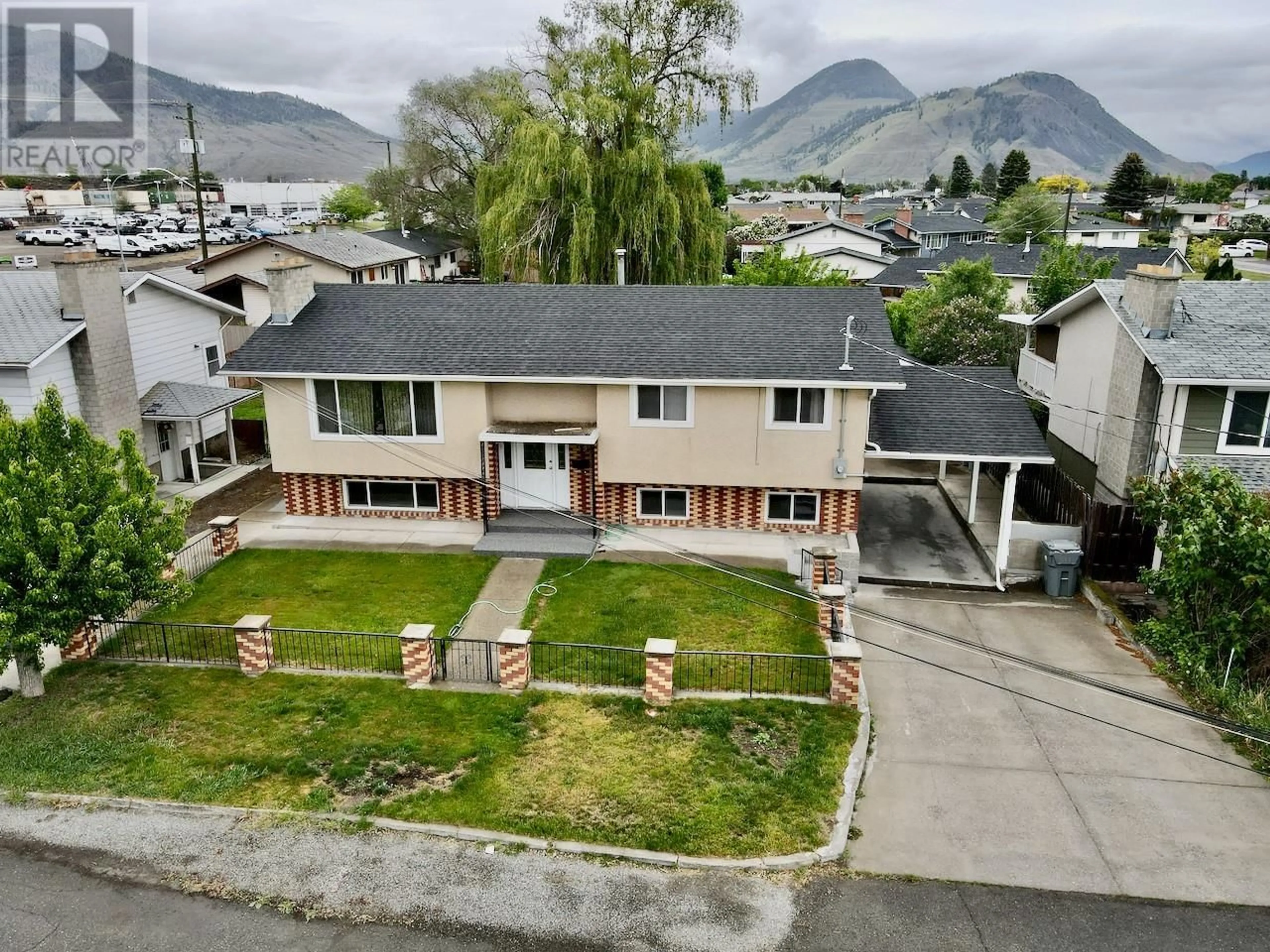 A pic from outside/outdoor area/front of a property/back of a property/a pic from drone, mountain view for 1290 KIMBERLEY CRES CRESCENT, Kamloops British Columbia V2B3B7
