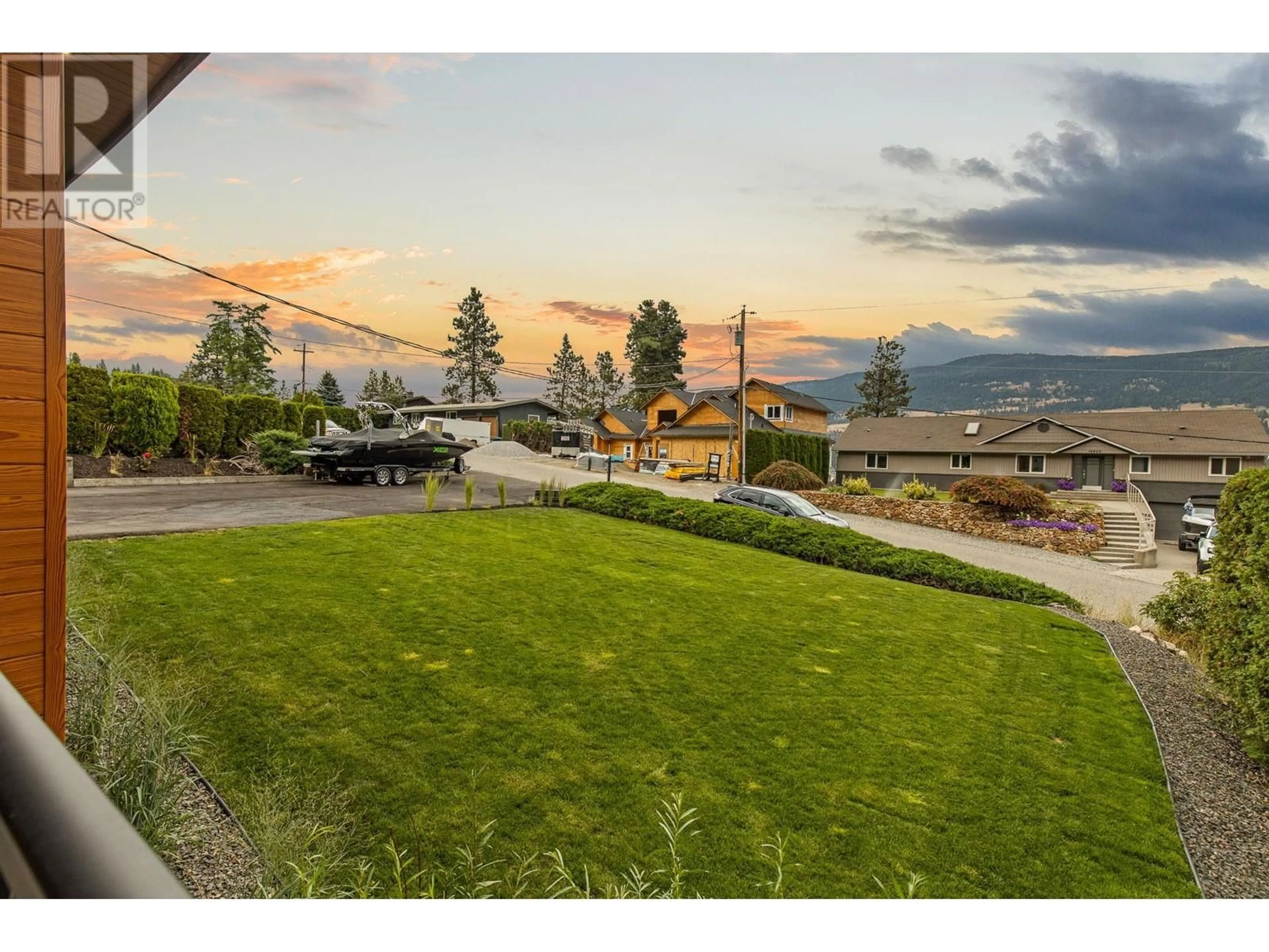 A pic from outside/outdoor area/front of a property/back of a property/a pic from drone, mountain view for 12622 PONDEROSA DRIVE, Lake Country British Columbia V4V2G9