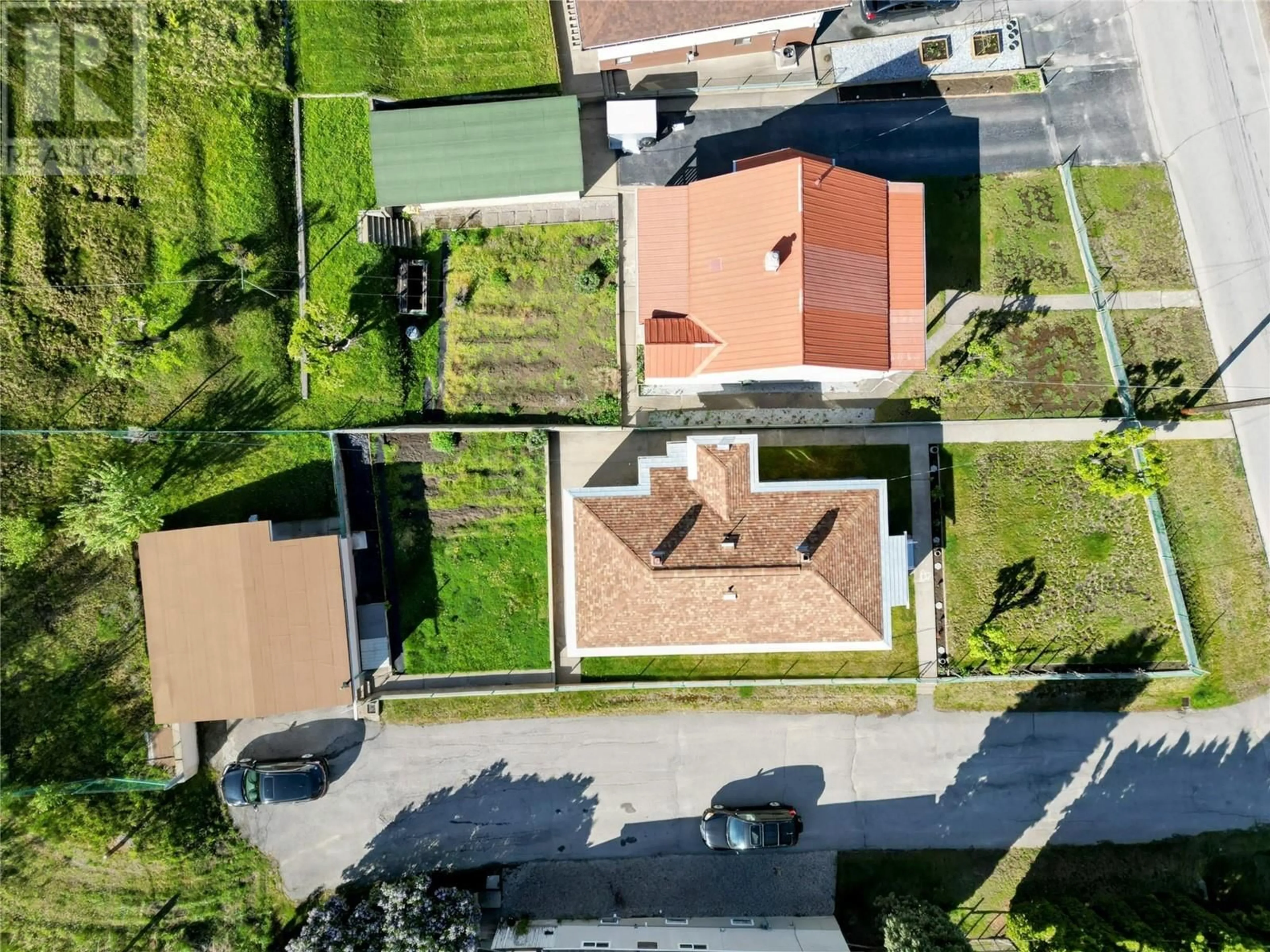 A pic from outside/outdoor area/front of a property/back of a property/a pic from drone, street for 208 HAIG STREET, Warfield British Columbia V1R2L9
