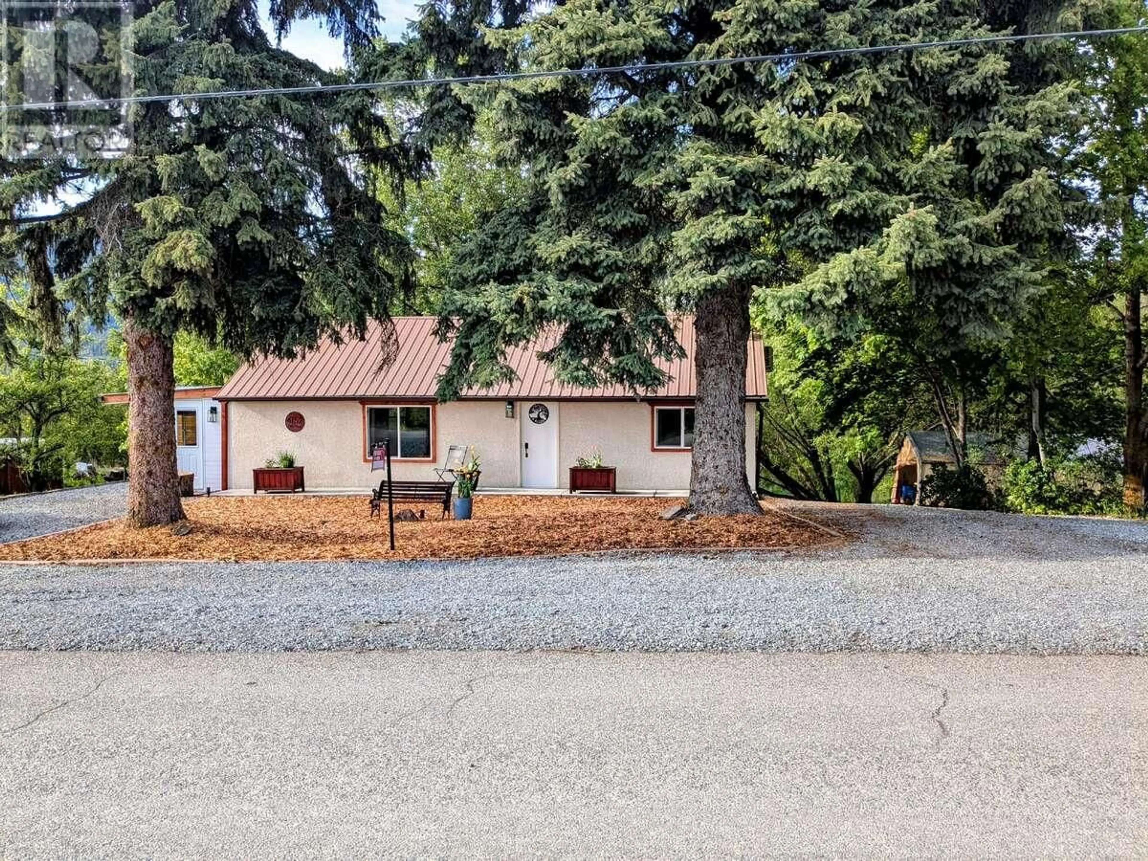 A pic from outside/outdoor area/front of a property/back of a property/a pic from drone, street for 4152 51 STREET, Canyon British Columbia V0B1C1