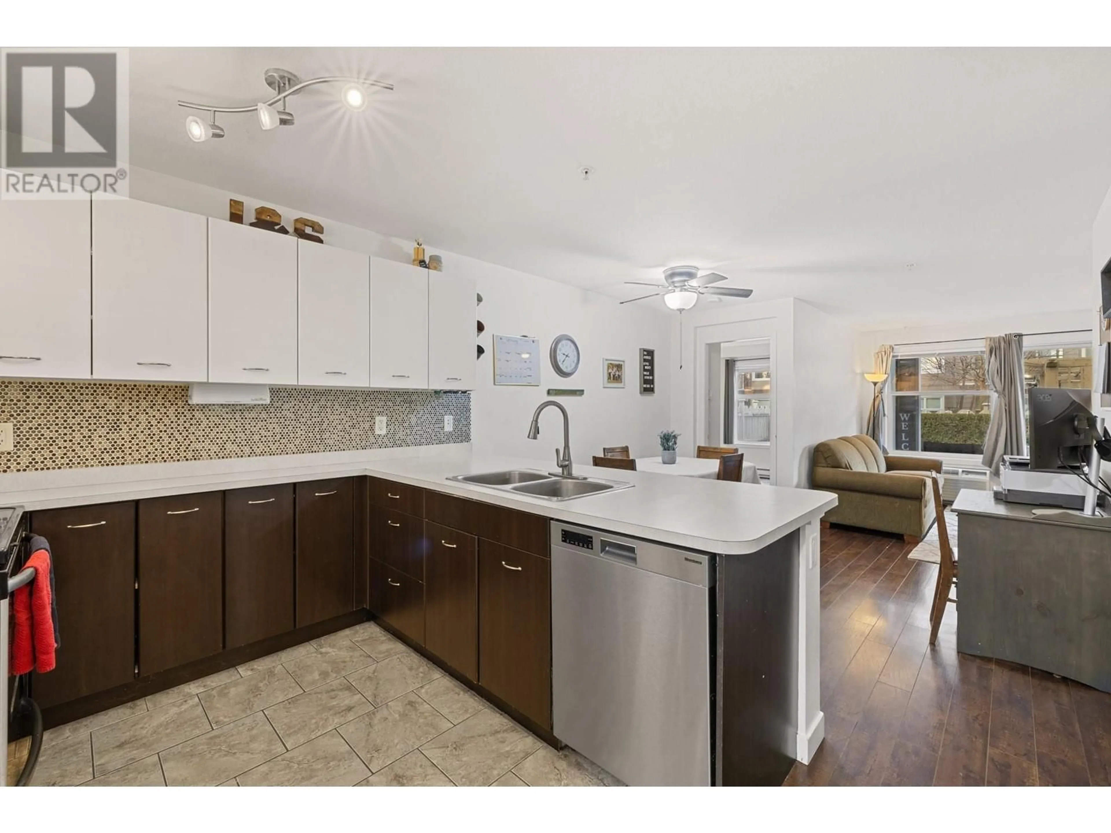 Open concept kitchen, ceramic/tile floor for 104 - 539 YATES ROAD, Kelowna British Columbia V1V2T8