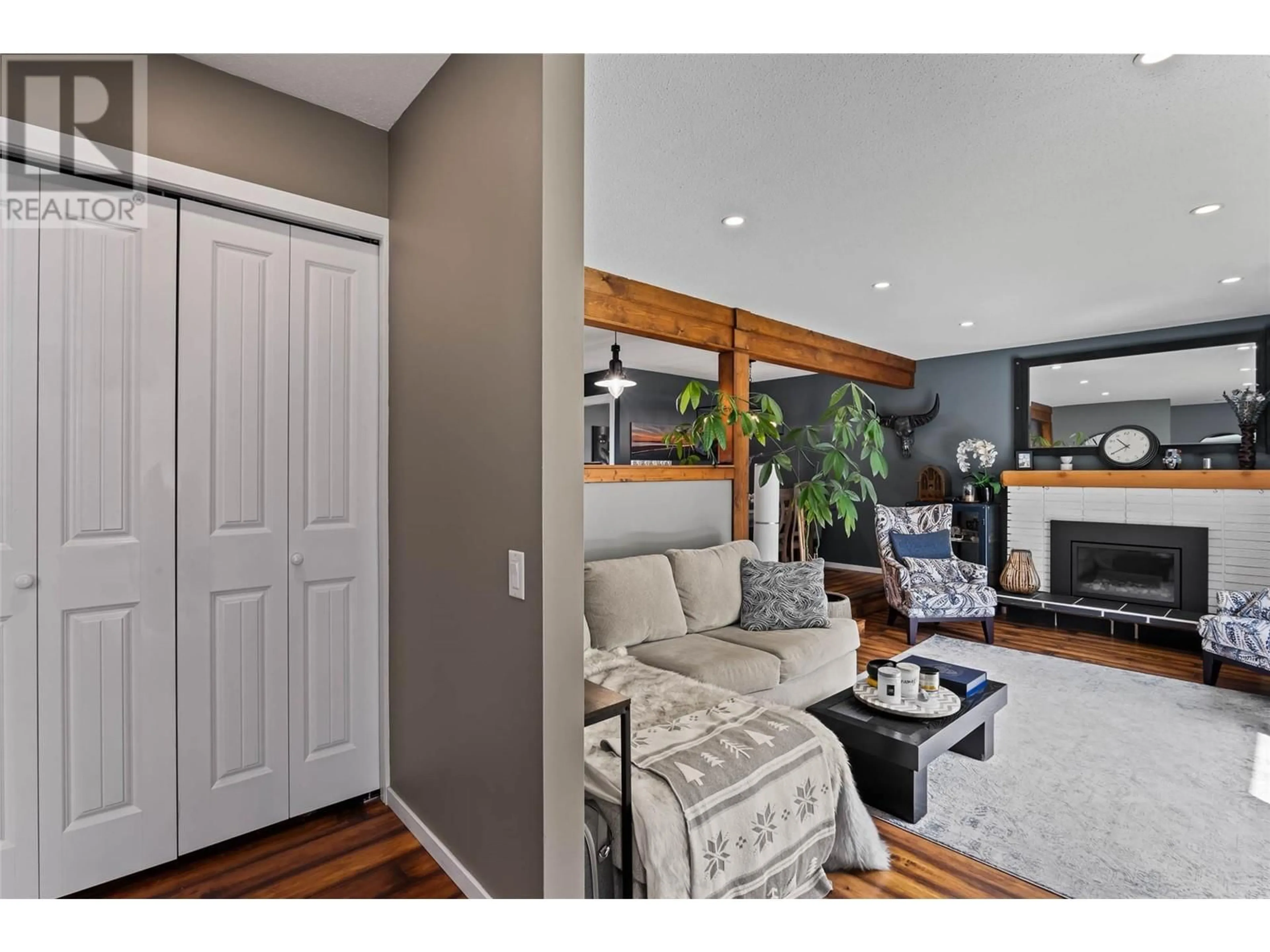 Living room with furniture, wood/laminate floor for 1191 SCHUBERT DRIVE, Kamloops British Columbia V2B7M4