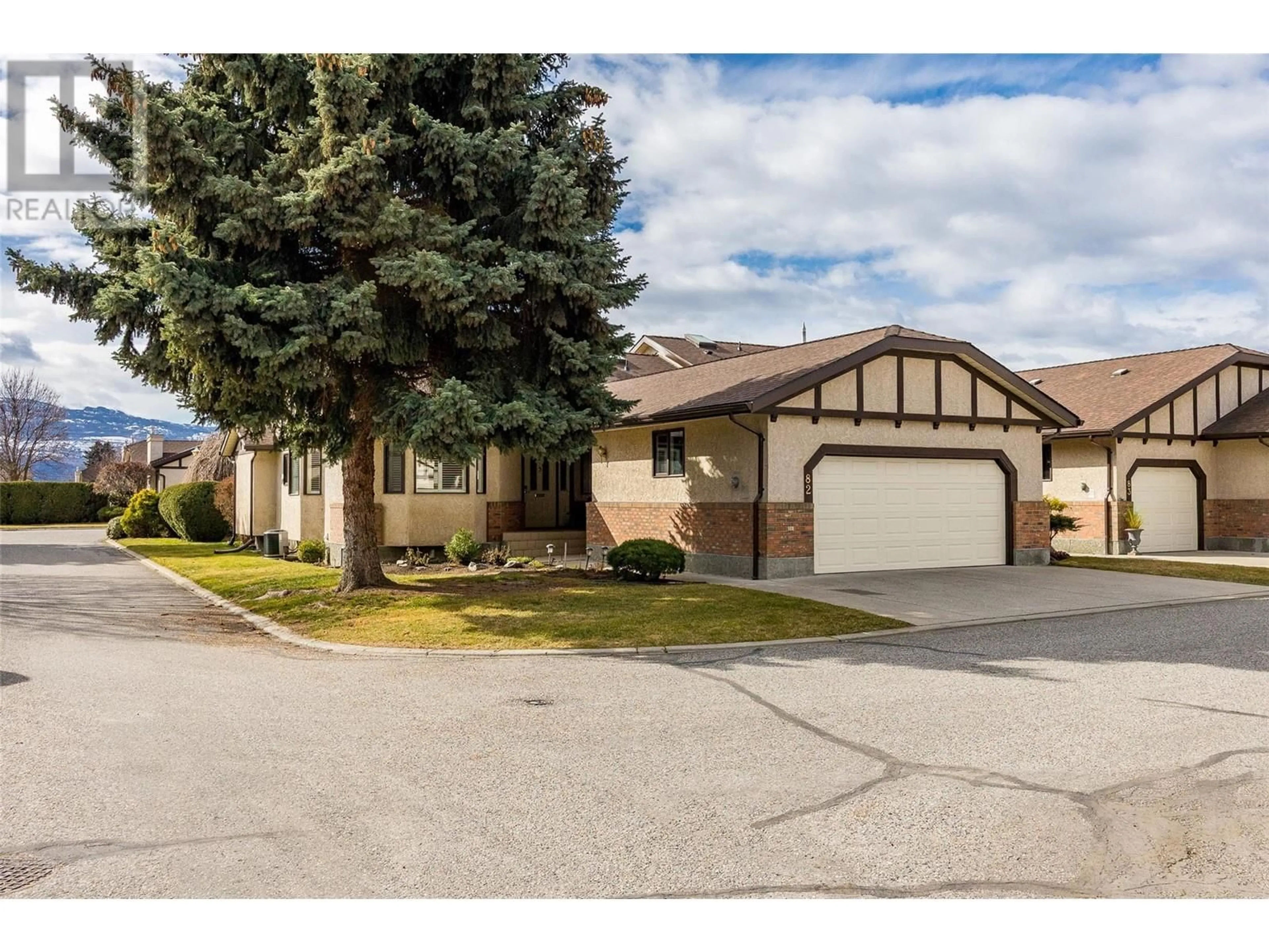 Home with vinyl exterior material, street for 82 - 2200 GORDON DRIVE, Kelowna British Columbia V1Y8T7