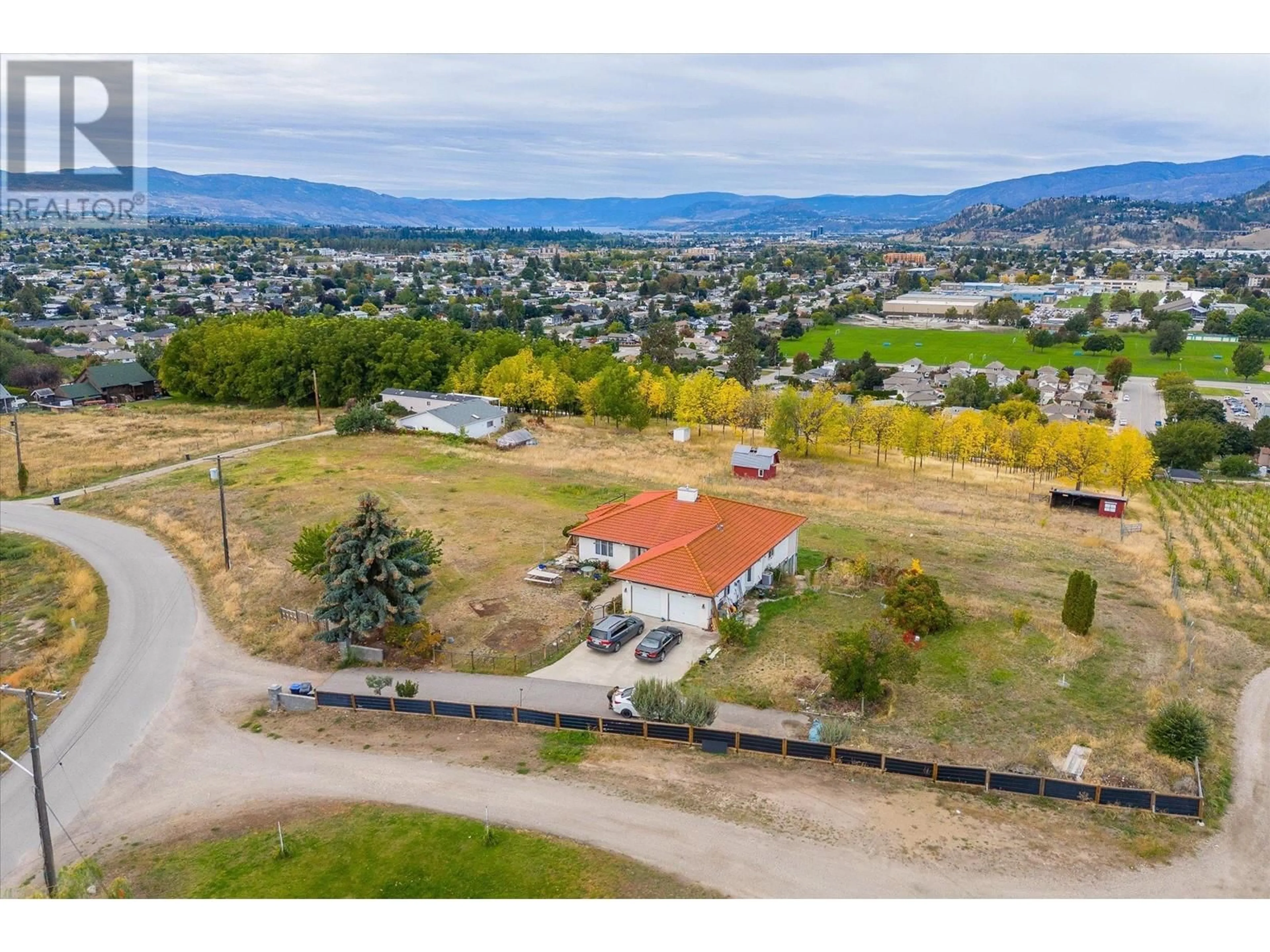 A pic from outside/outdoor area/front of a property/back of a property/a pic from drone, mountain view for 848 WEBSTER ROAD, Kelowna British Columbia V1P1C2