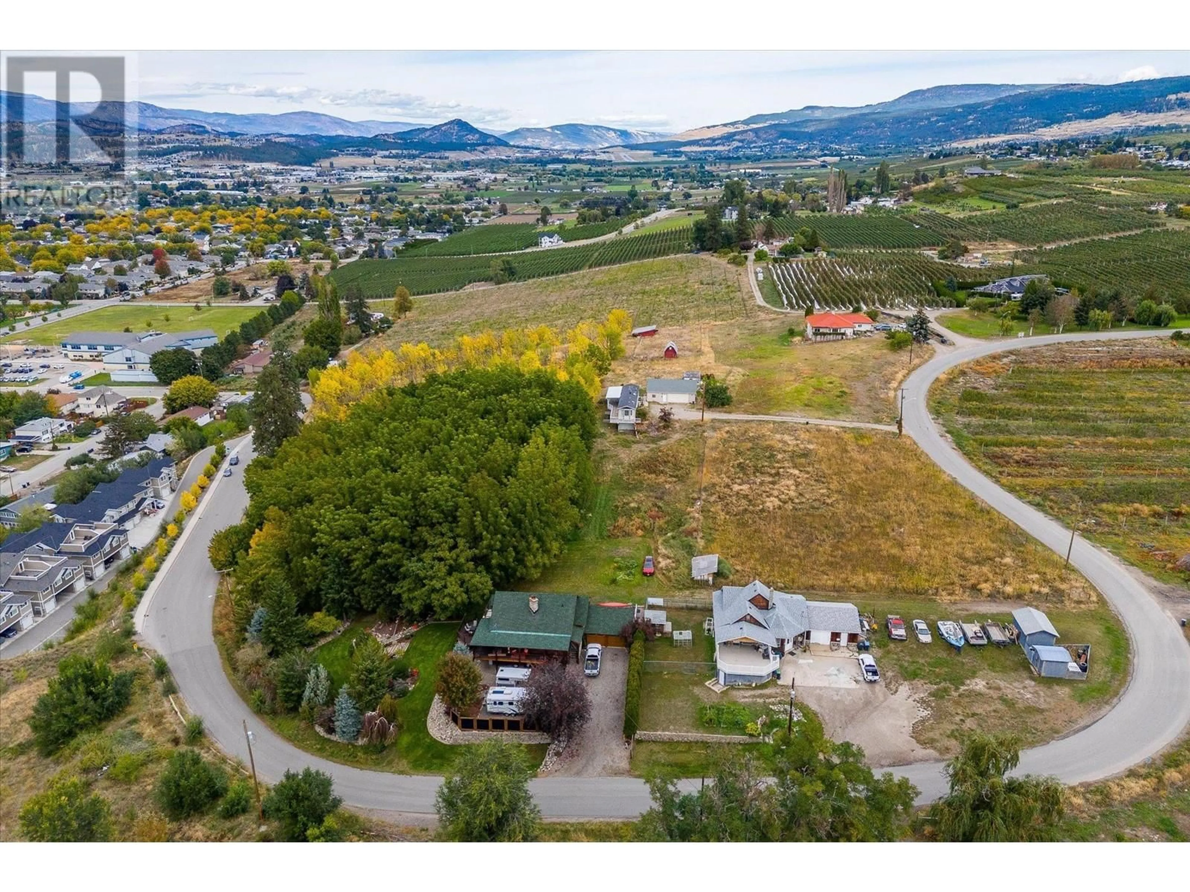 A pic from outside/outdoor area/front of a property/back of a property/a pic from drone, mountain view for 848 WEBSTER ROAD, Kelowna British Columbia V1P1C2