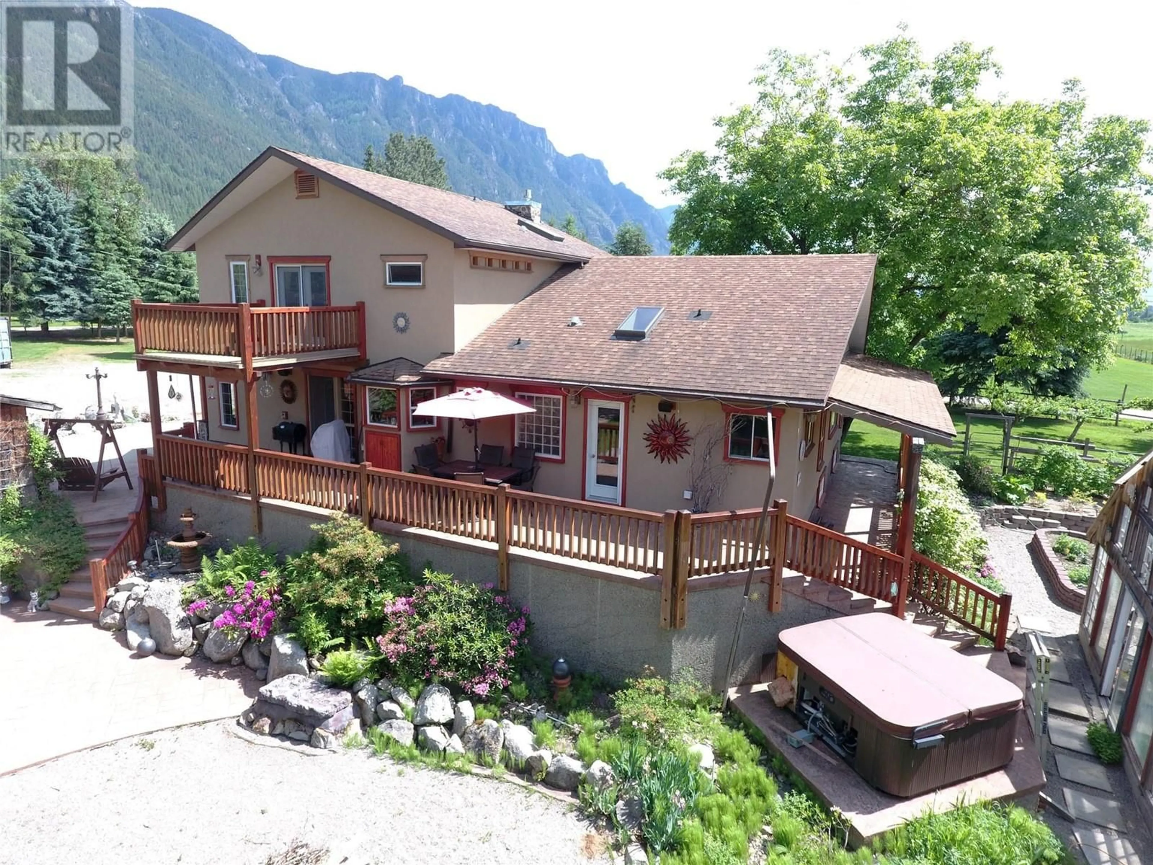 A pic from outside/outdoor area/front of a property/back of a property/a pic from drone, mountain view for 4554 44TH STREET, Canyon British Columbia V0B1C1