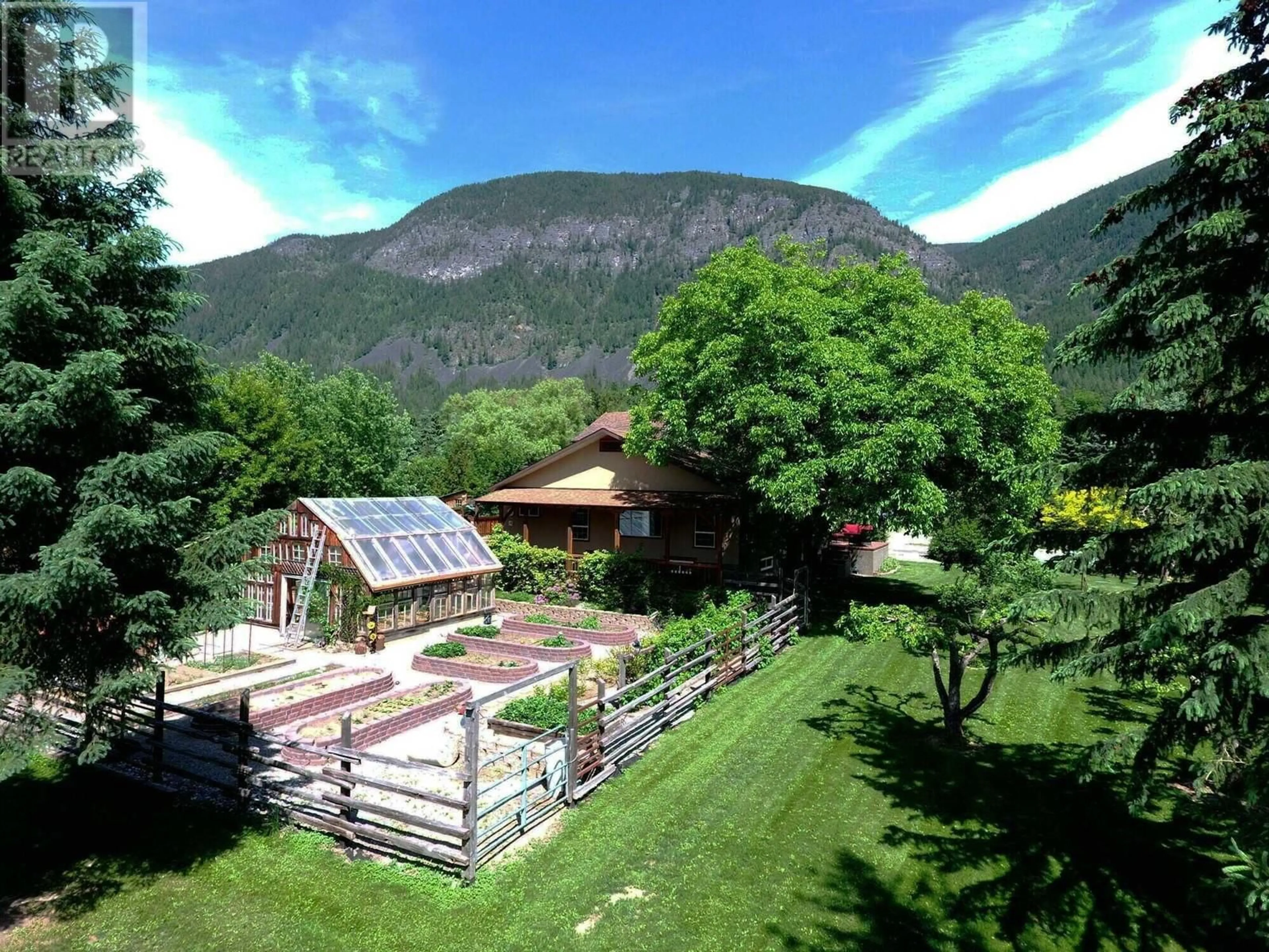 A pic from outside/outdoor area/front of a property/back of a property/a pic from drone, mountain view for 4554 44TH STREET, Canyon British Columbia V0B1C1