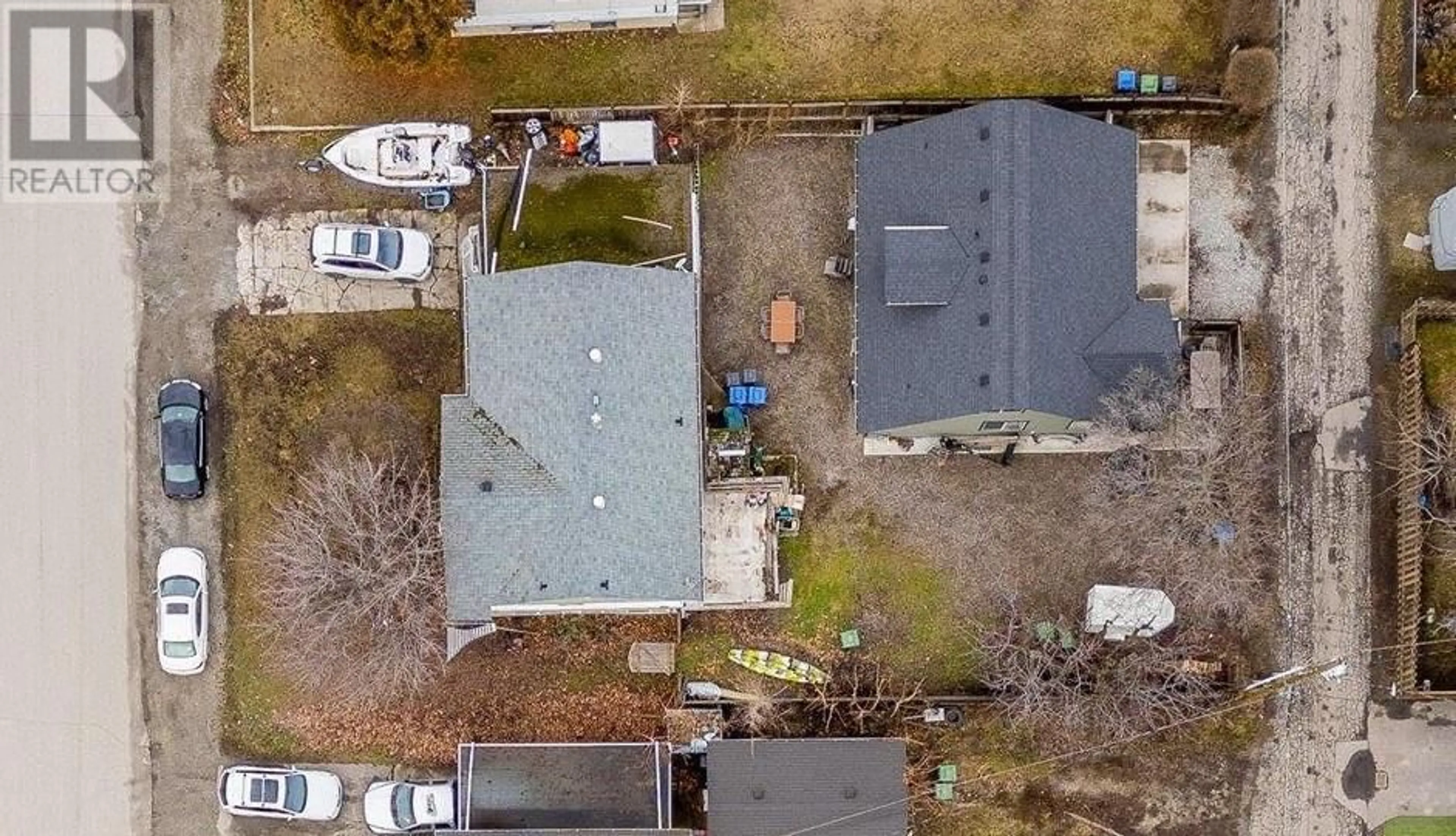 A pic from outside/outdoor area/front of a property/back of a property/a pic from drone, street for 2261 BURNETT STREET, Kelowna British Columbia V1Y2T7