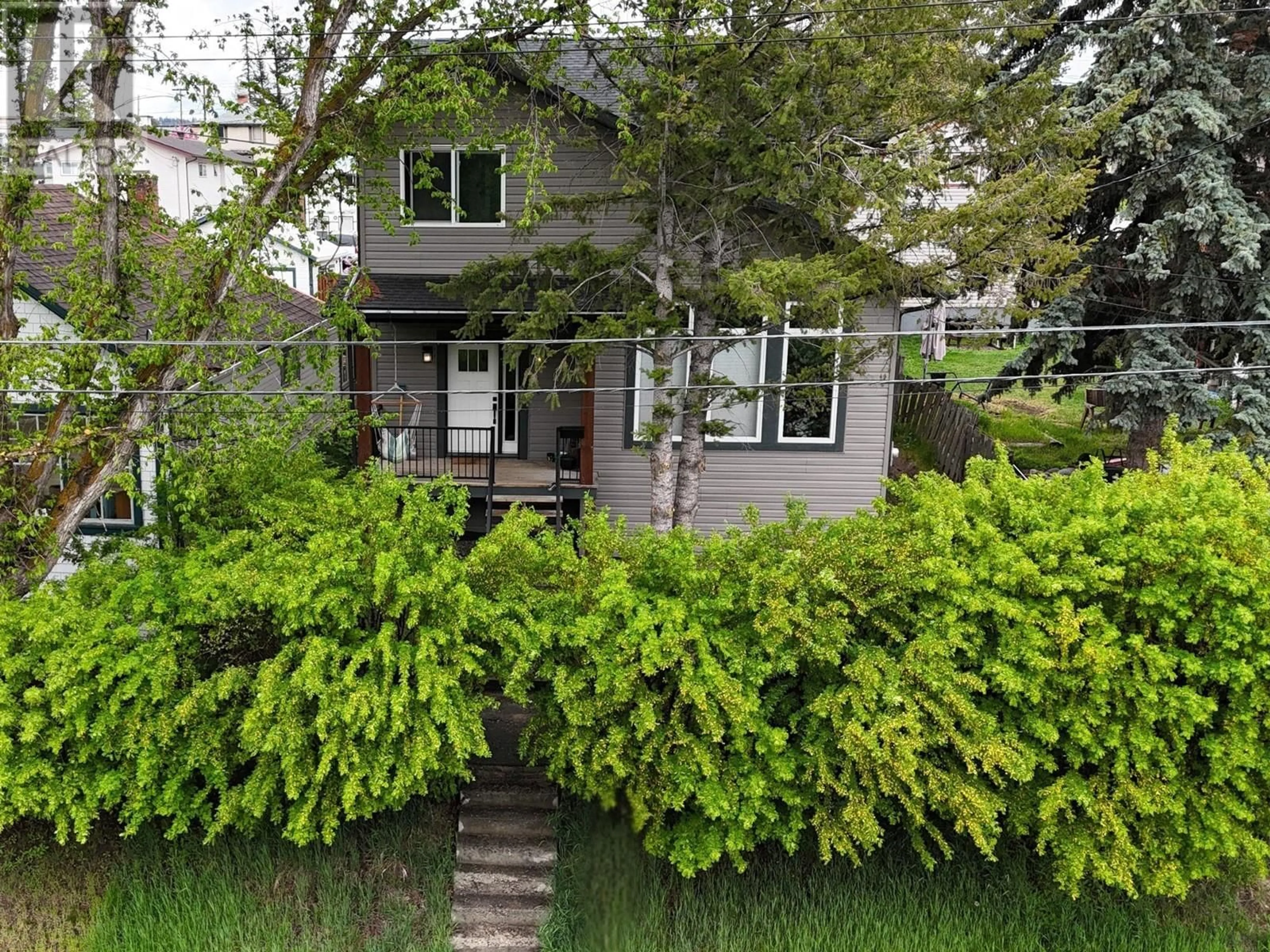 A pic from outside/outdoor area/front of a property/back of a property/a pic from drone, street for 208 15TH AVENUE SOUTH, Cranbrook British Columbia V1C2Y6