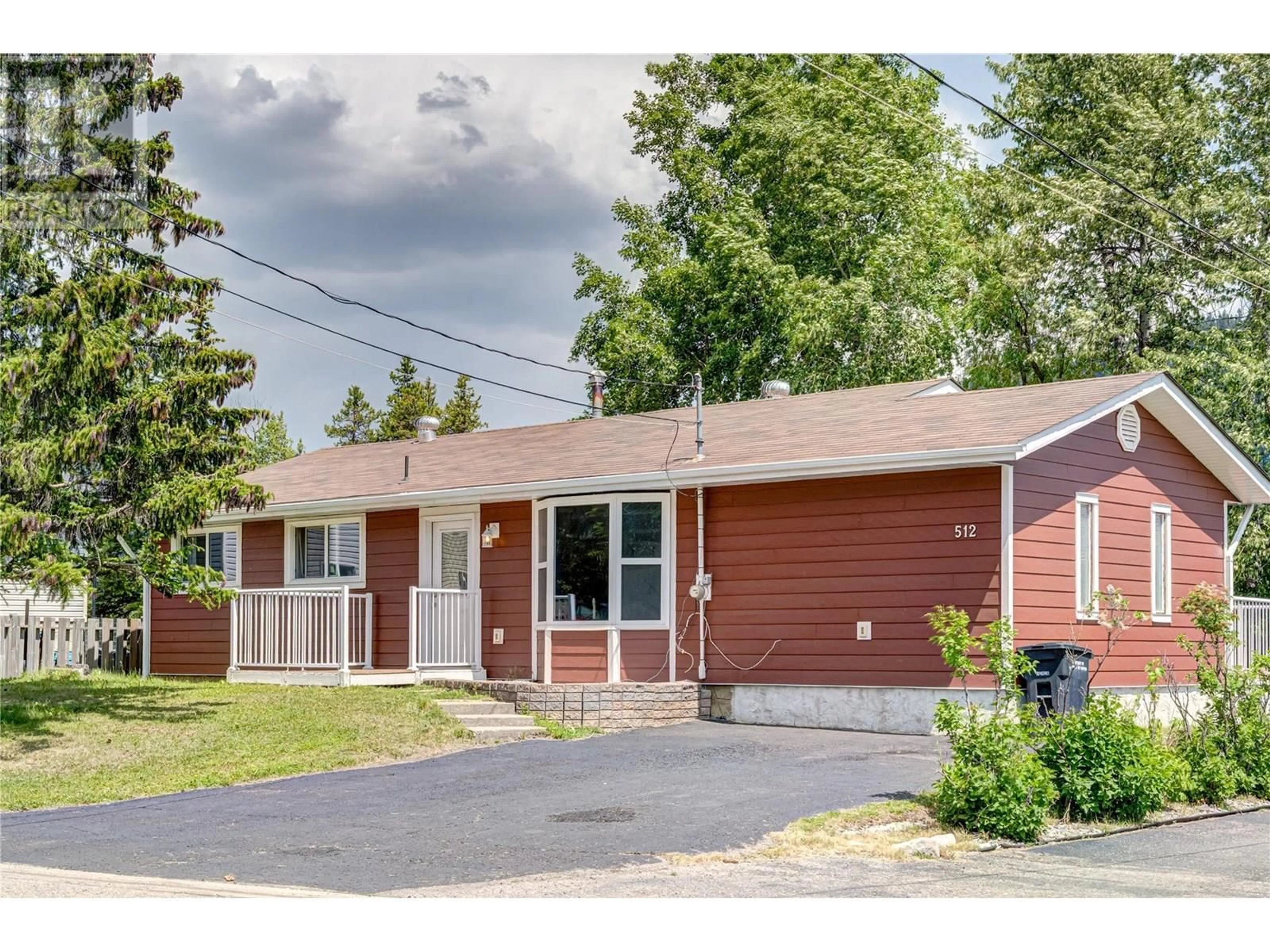 Home with brick exterior material, street for 512 ELK STREET, Elkford British Columbia V0B1H0