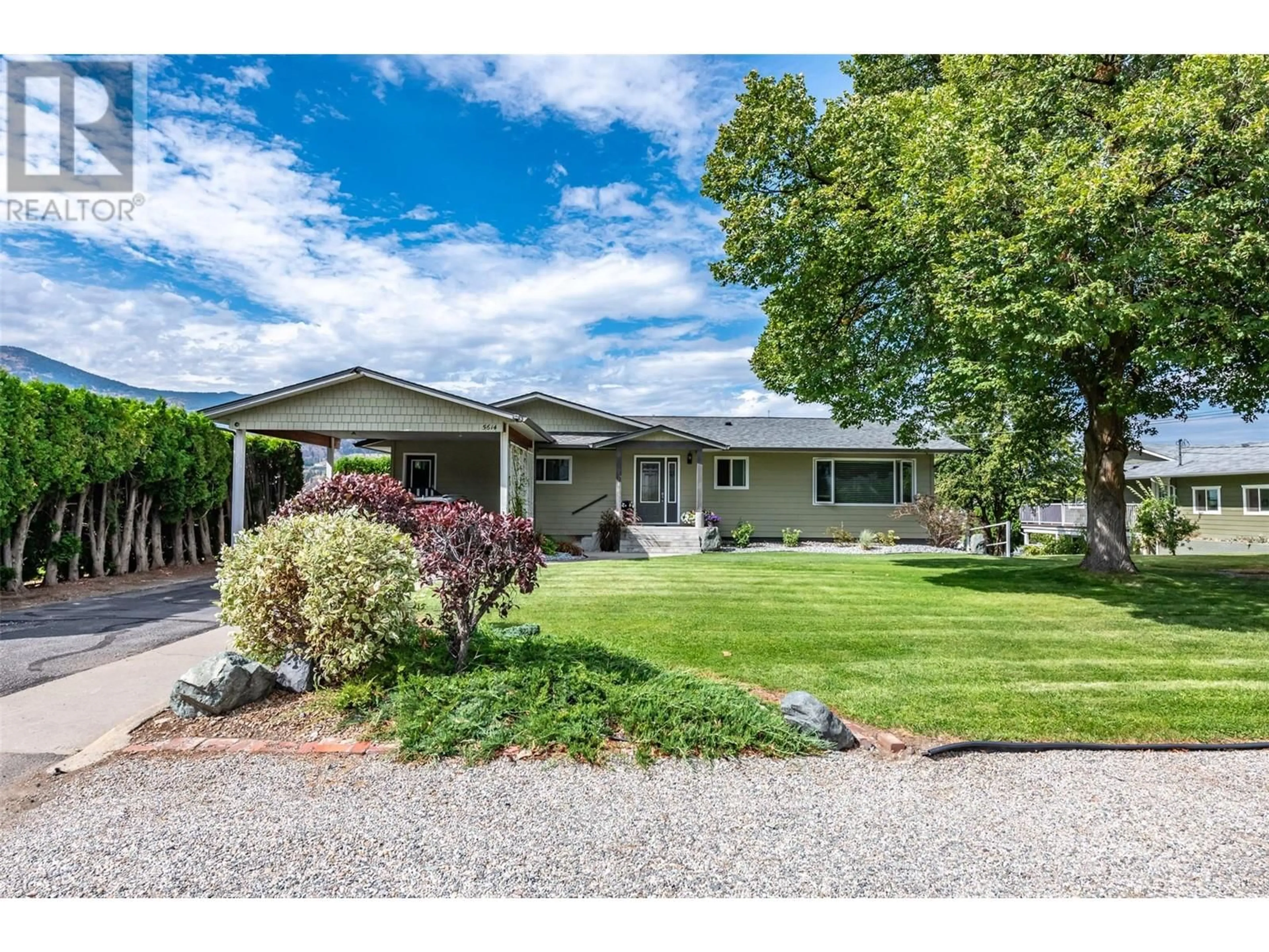 Home with vinyl exterior material, mountain view for 5614 YARROW STREET, Oliver British Columbia V0H1T9